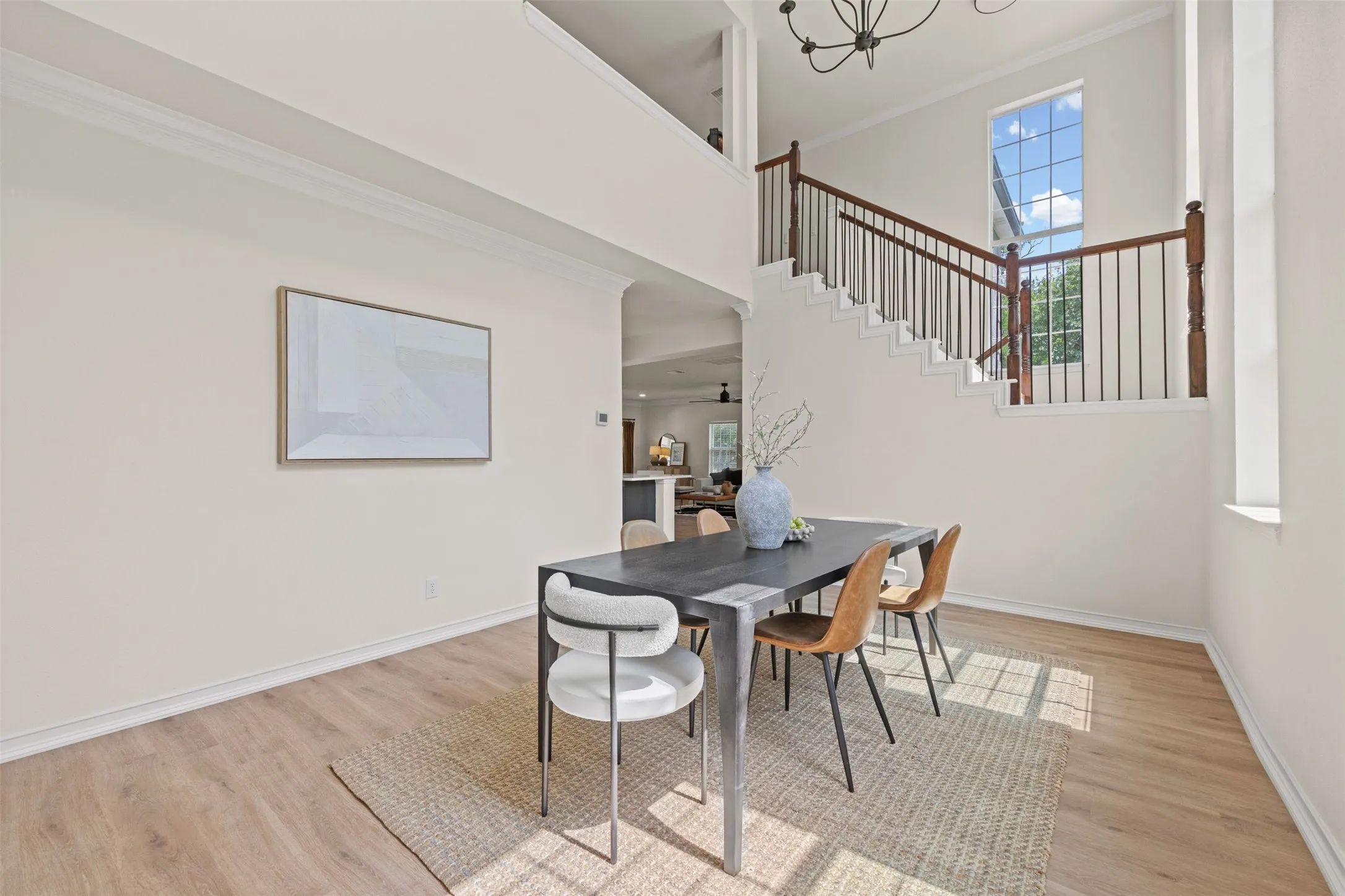 Dining area overlooking the backyard and outdoor living spaces
