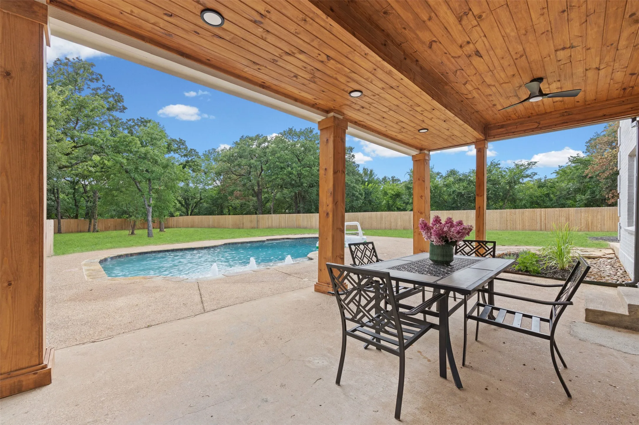 Second cedar wrapped patio: perfect for sunsets and socializing by the pool