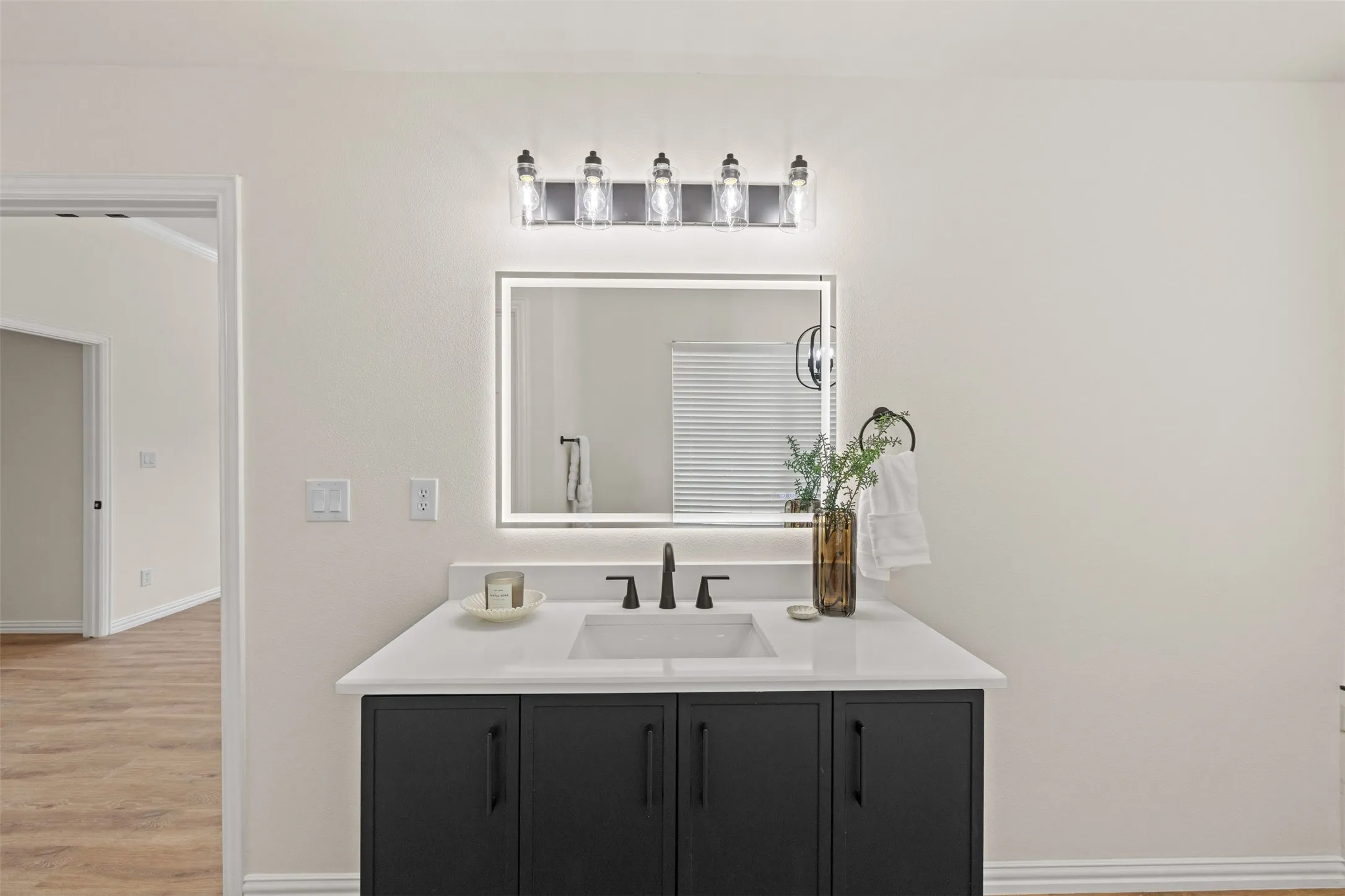 Primary bathroom with dual vanity and soak tub