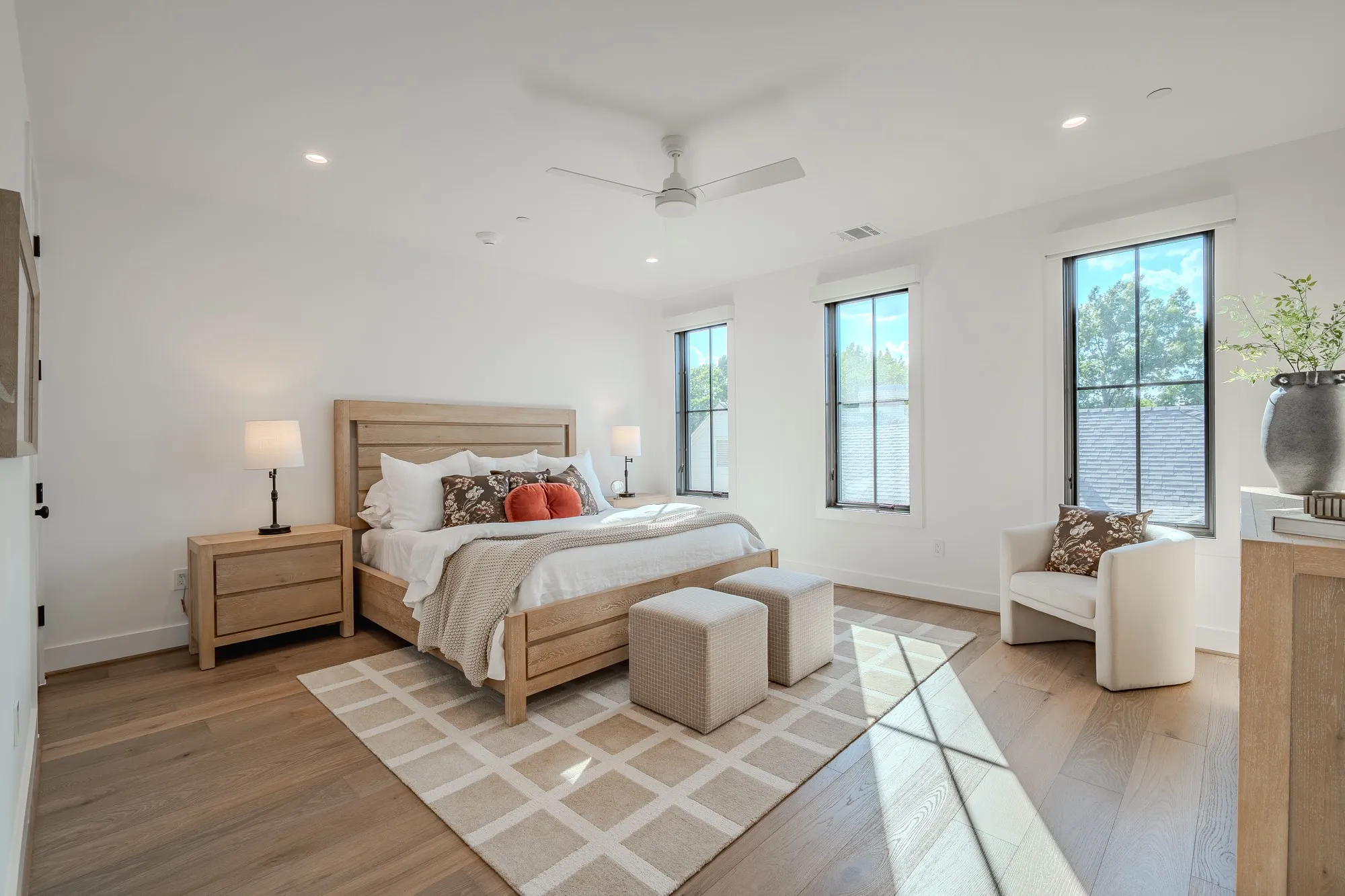 Bedroom featuring recessed lighting, light wood-type flooring, and a ceiling fan