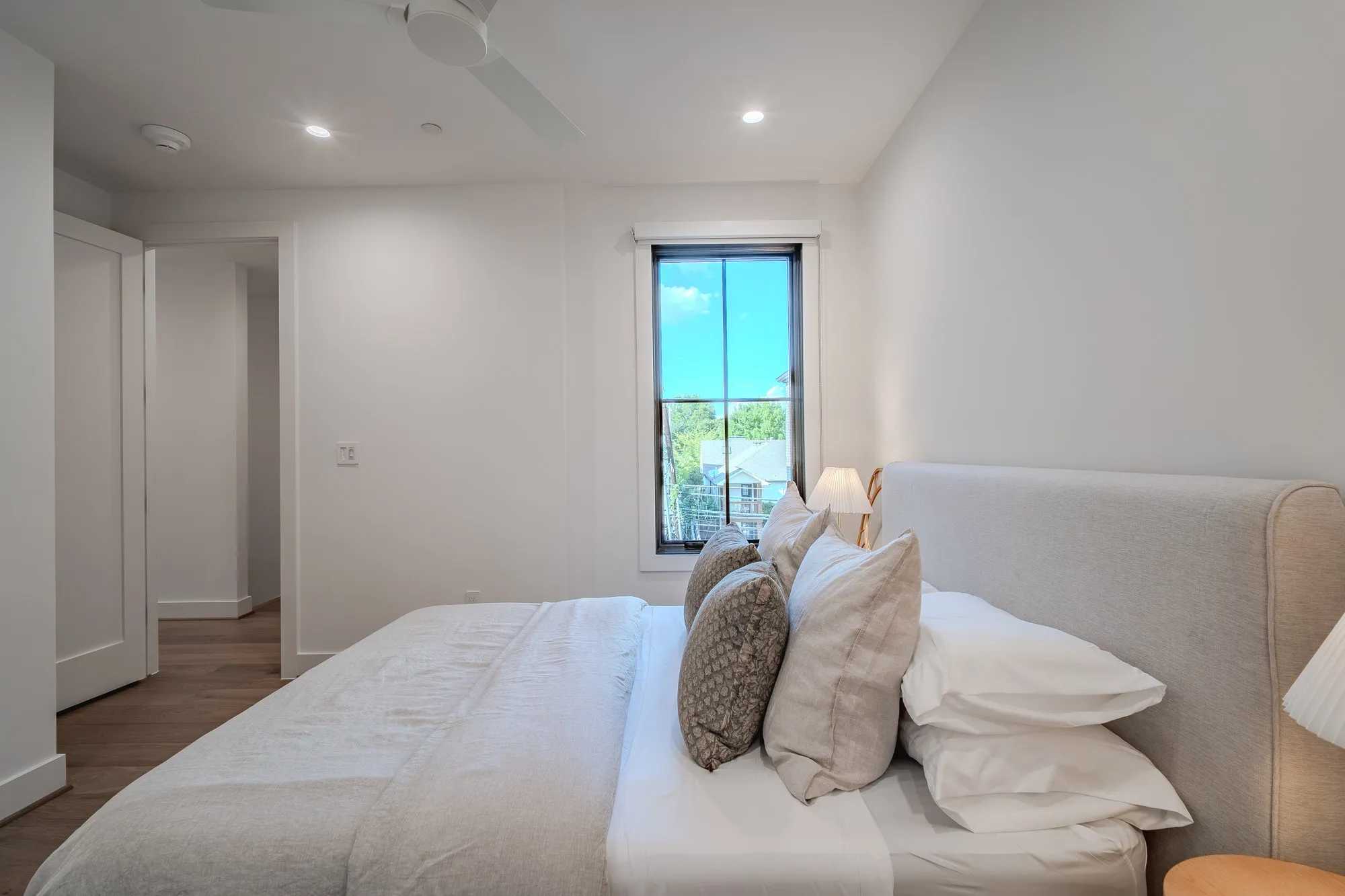 Bedroom featuring wood finished floors, recessed lighting, and a ceiling fan