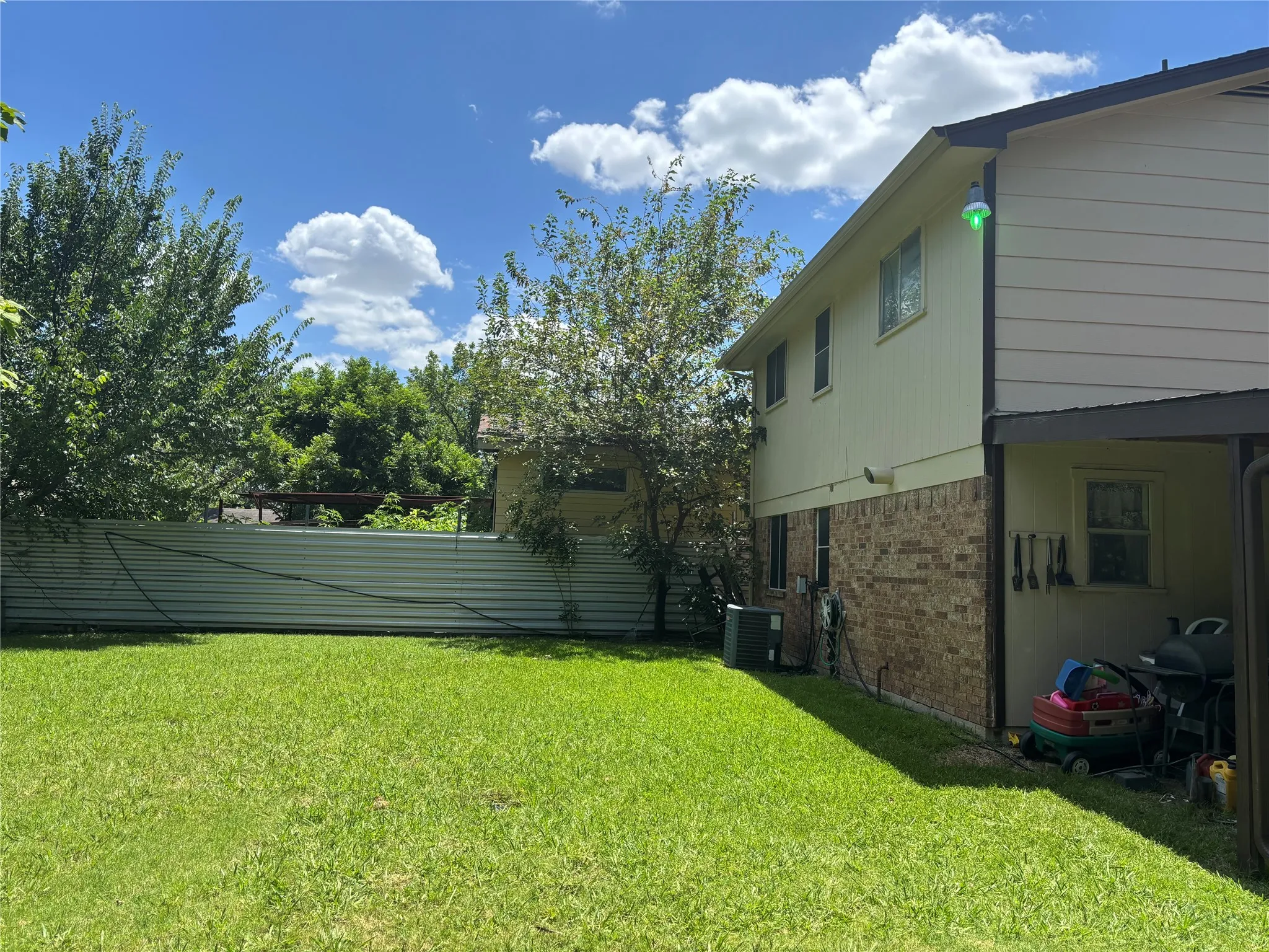 Lawn area with a privacy fence