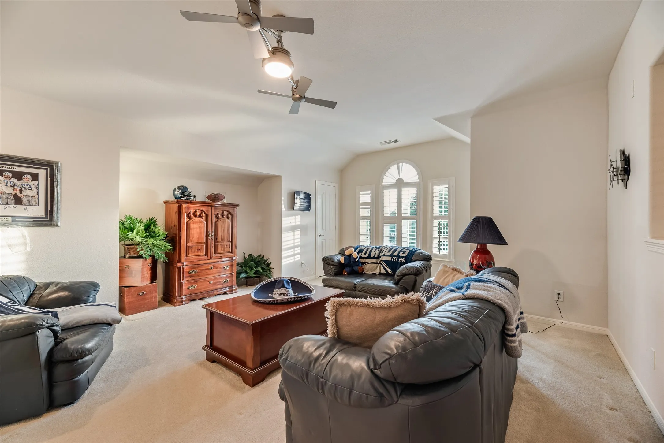 This media or game space is ready for the big game or fitness equipment.