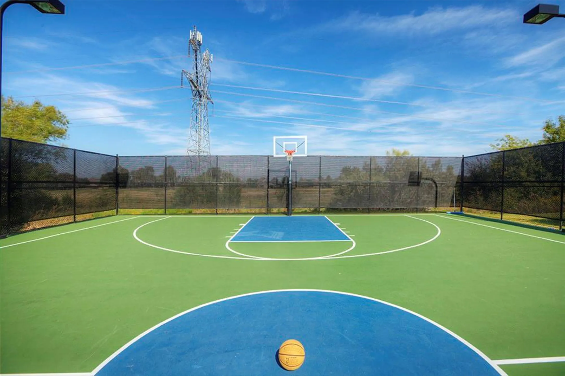 Grab a neighbor and dunk like Dirk! The basketball court is another one of the amazing amenities offered to our Lantana residents. All a part of your HOA package.