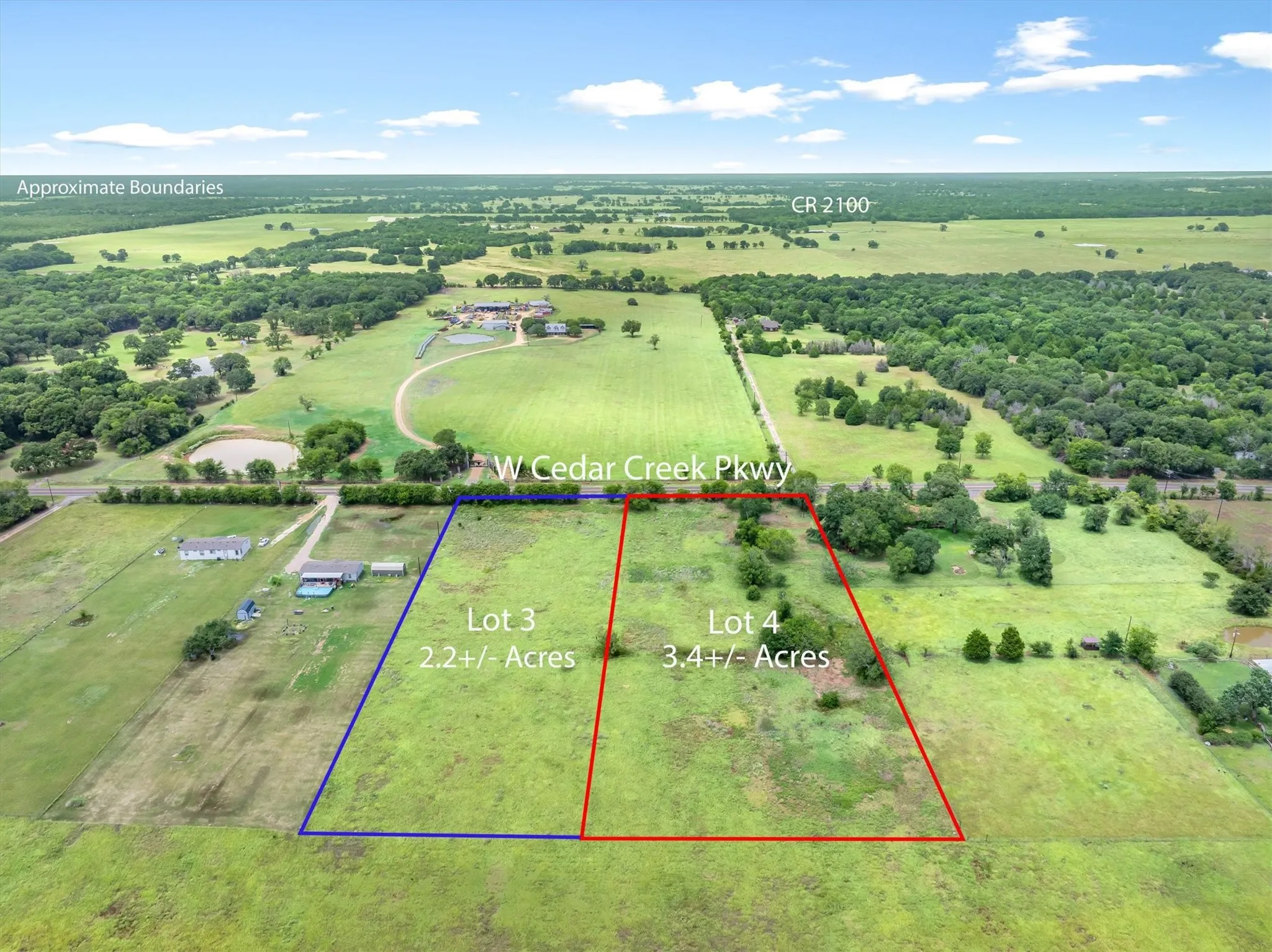 Expansive undeveloped land featuring designated parcels for Lot 3 (2.2+/- Acres) and Lot 4 (3.4+/- Acres)