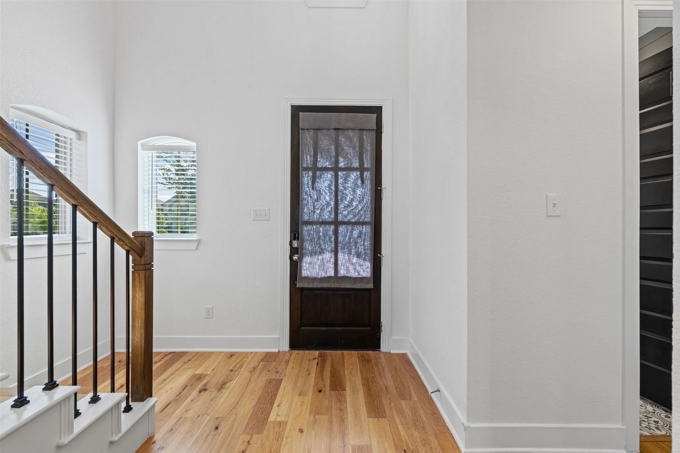 Hardwood-style flooring throughout
