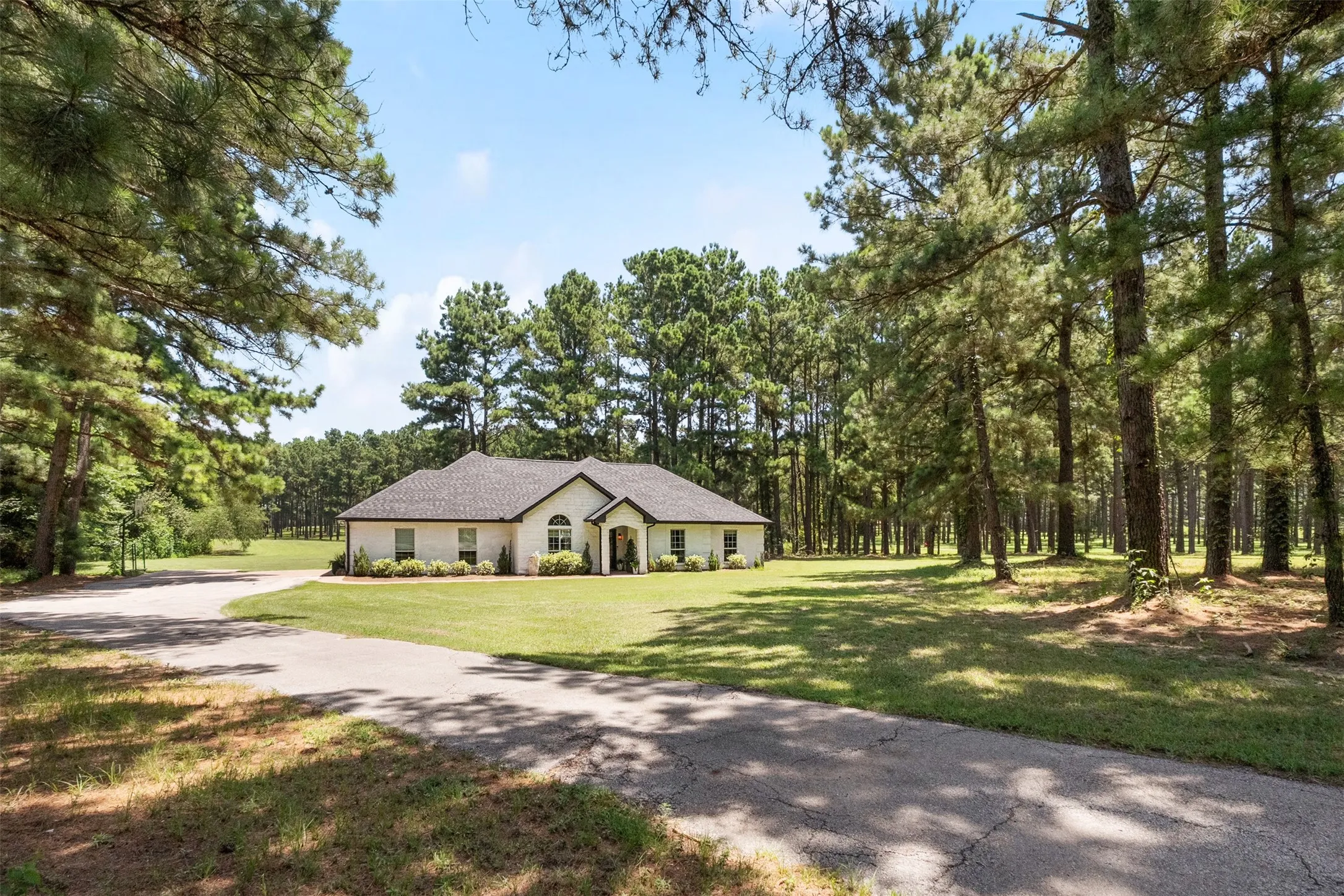 Street view of home on 3 acres, close to town, but no city taxes