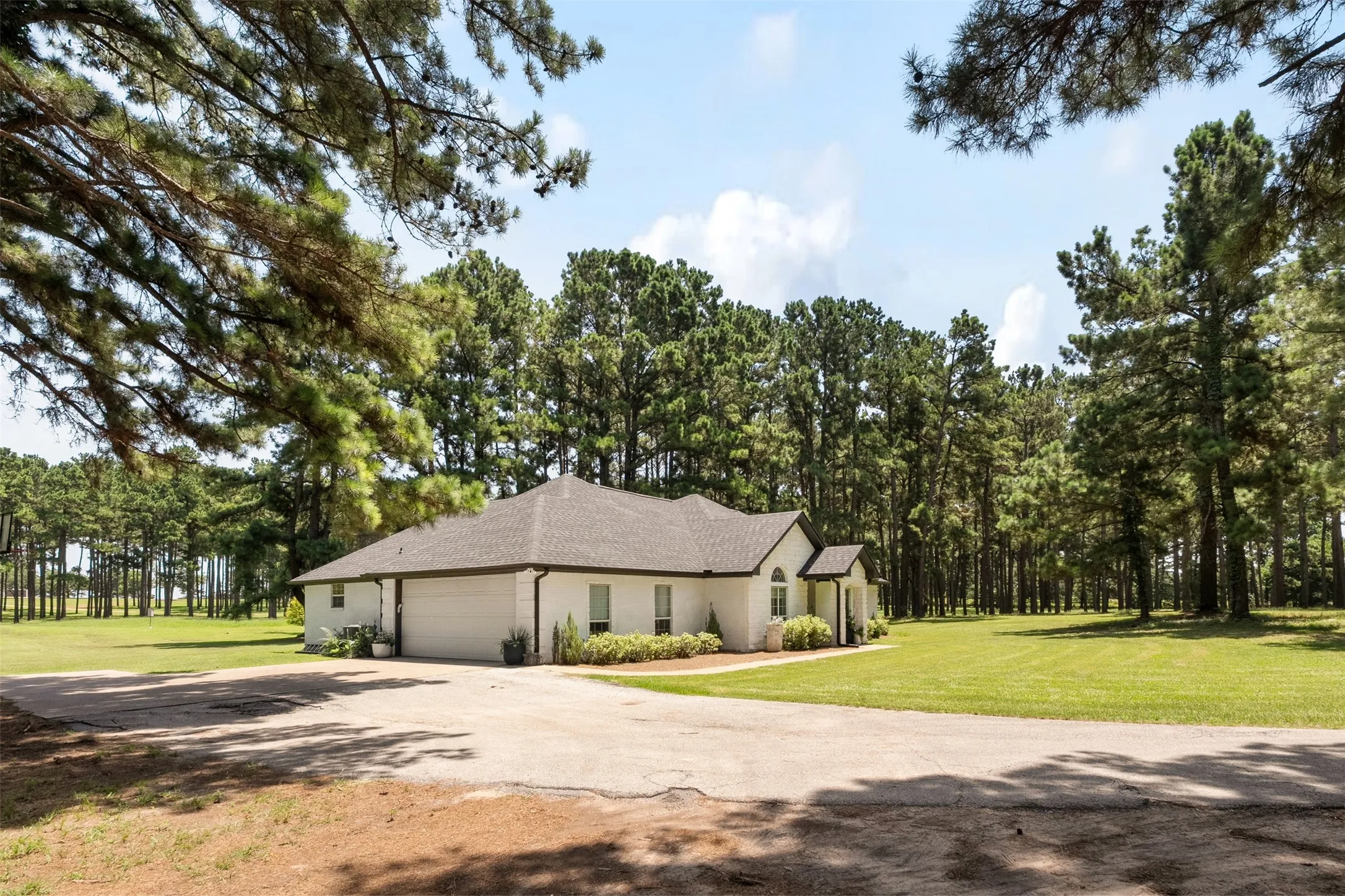 Side of home with 2 car garage