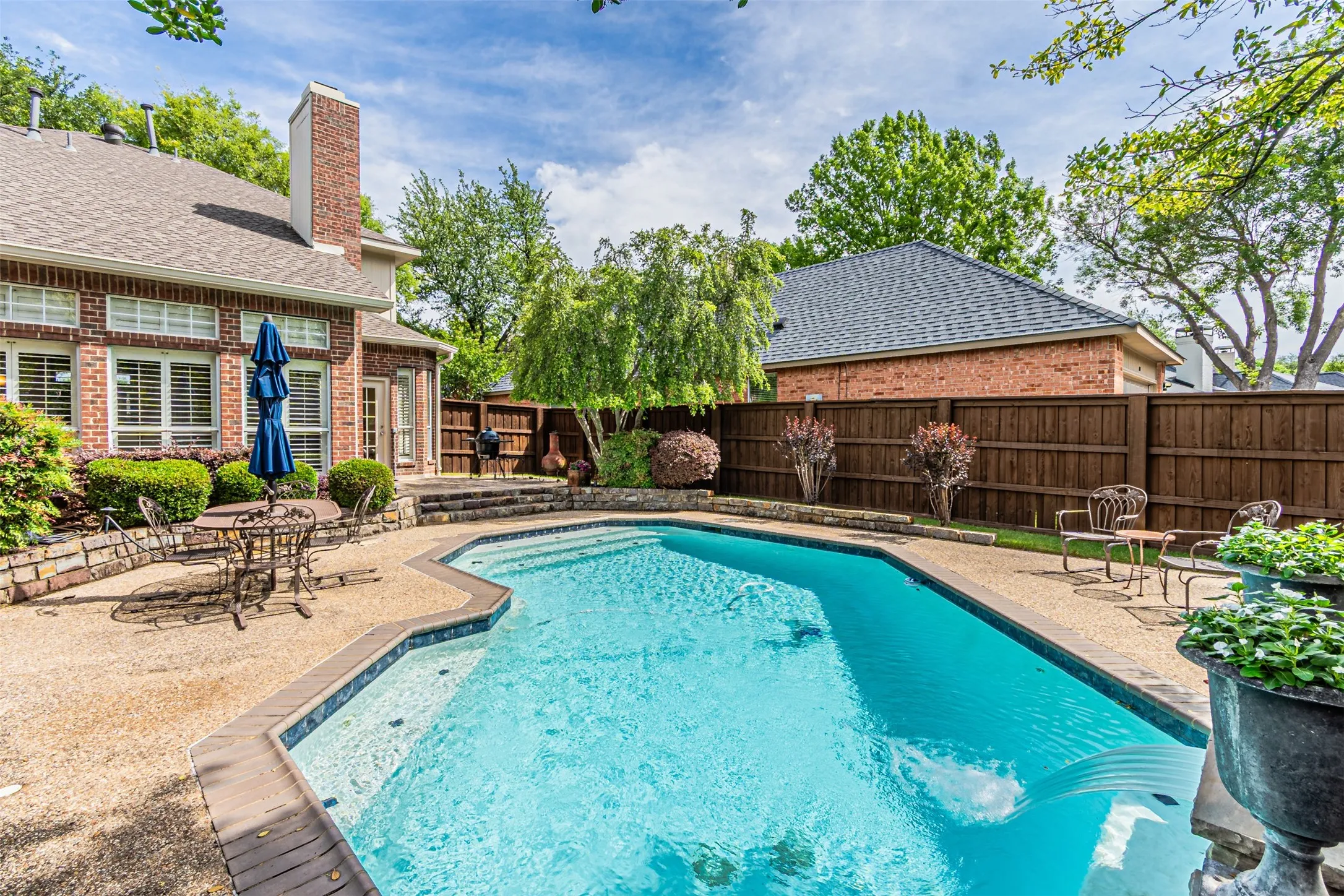 Patio seating alongside the pool for evenings with a cocktail or your morning coffee