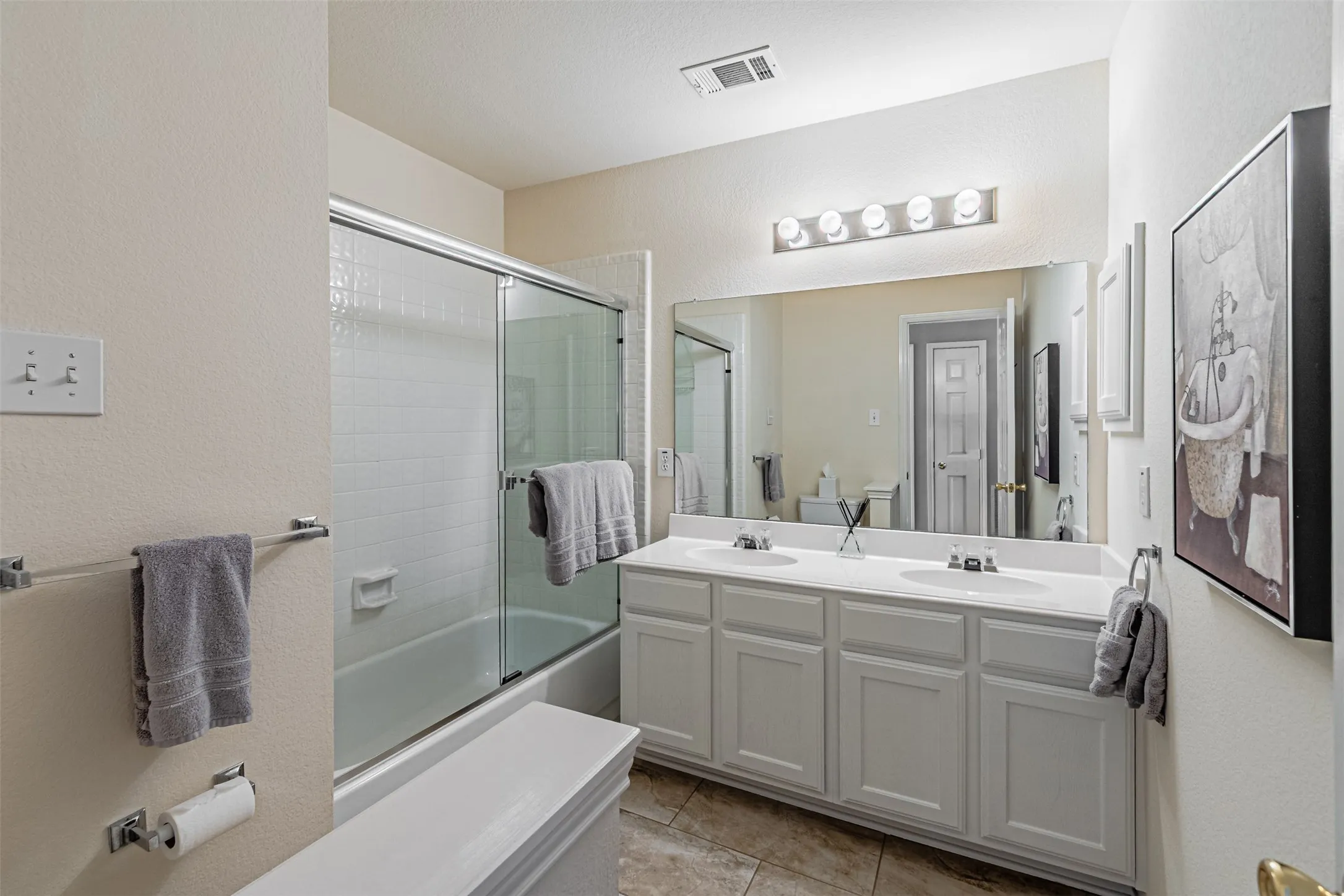 Full size bath upstairs with dual sinks