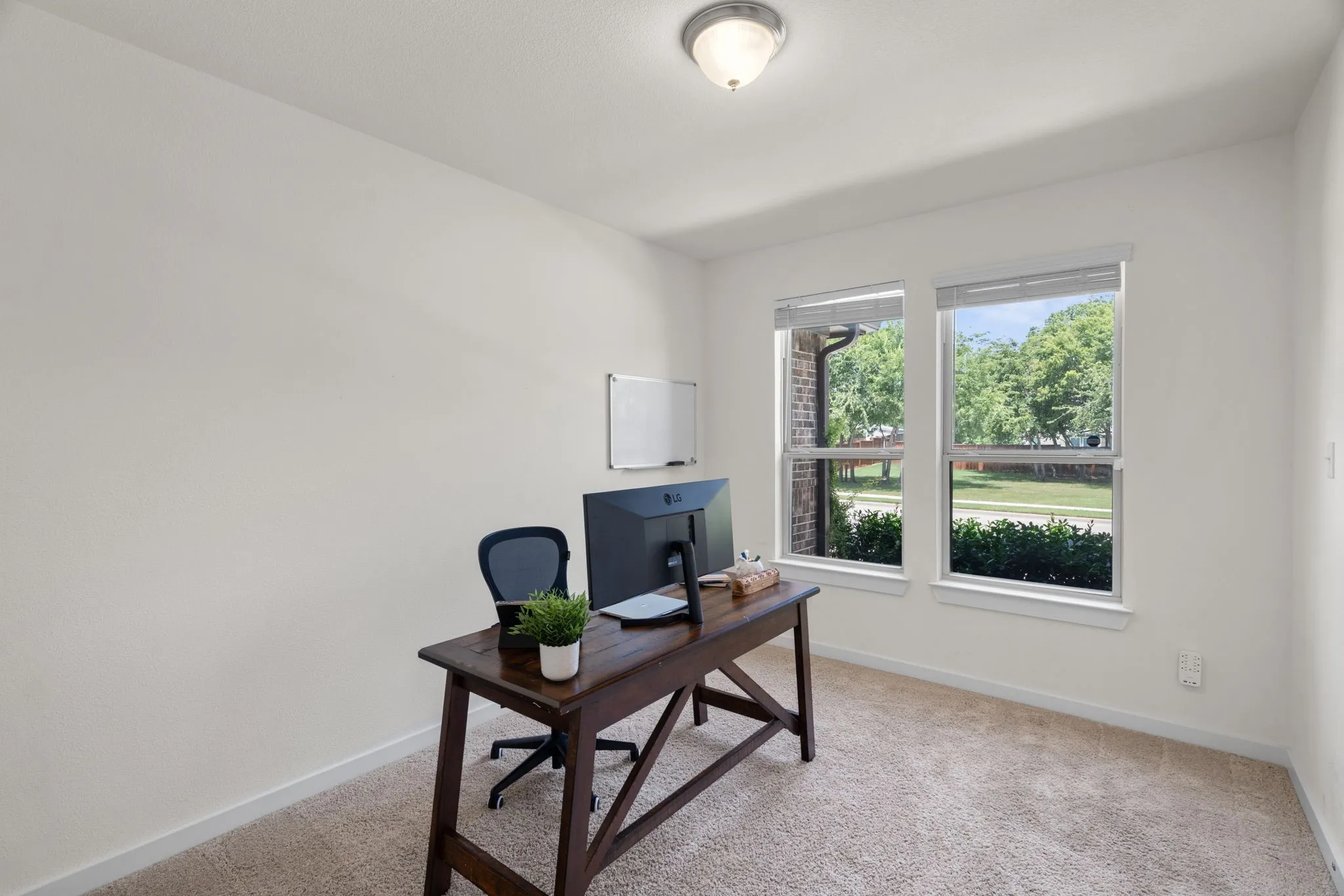 Neutral tone carpeting complementing light-colored walls