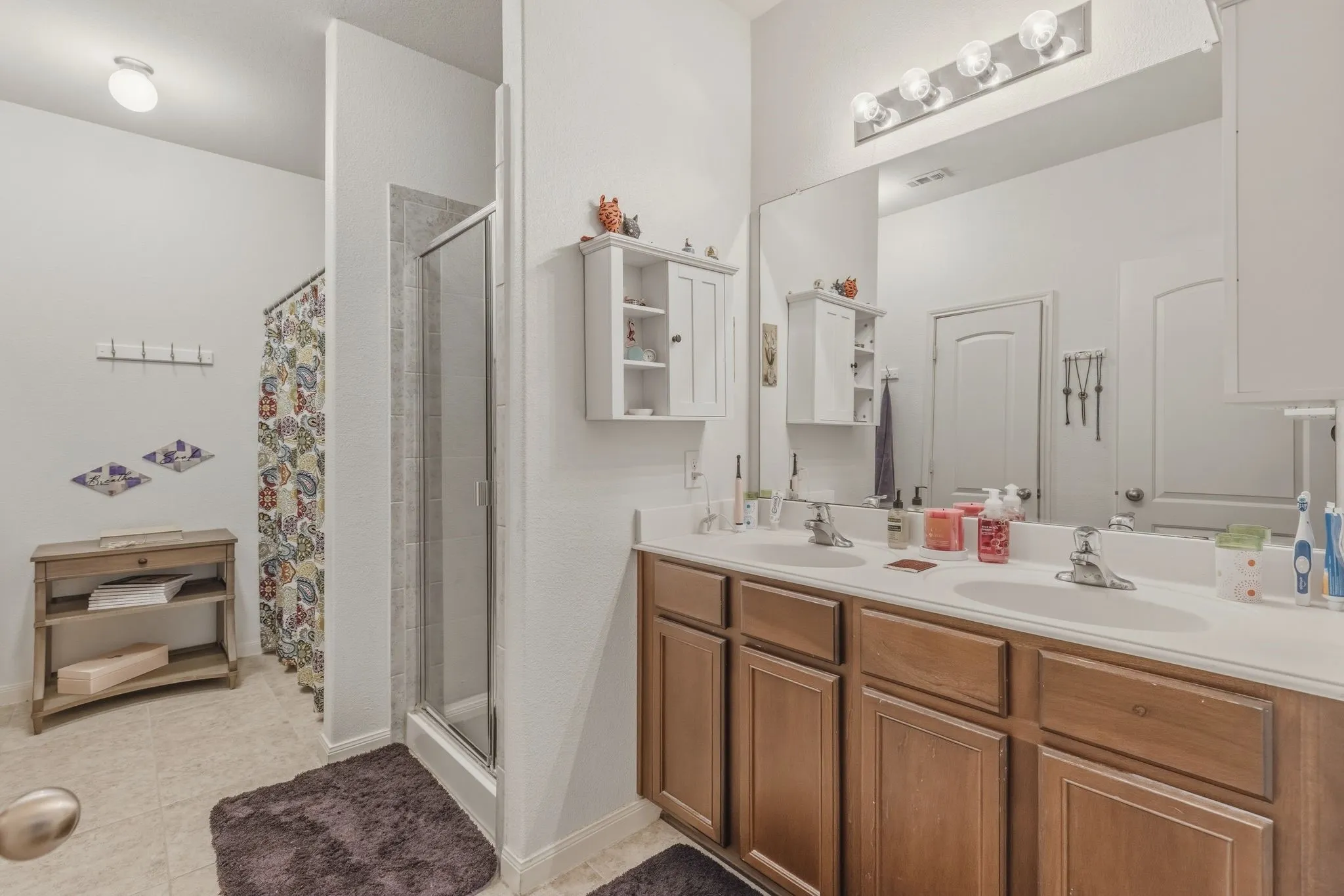 Primary Bathroom has separate shower, enclosed water closet and a walk-in closet.