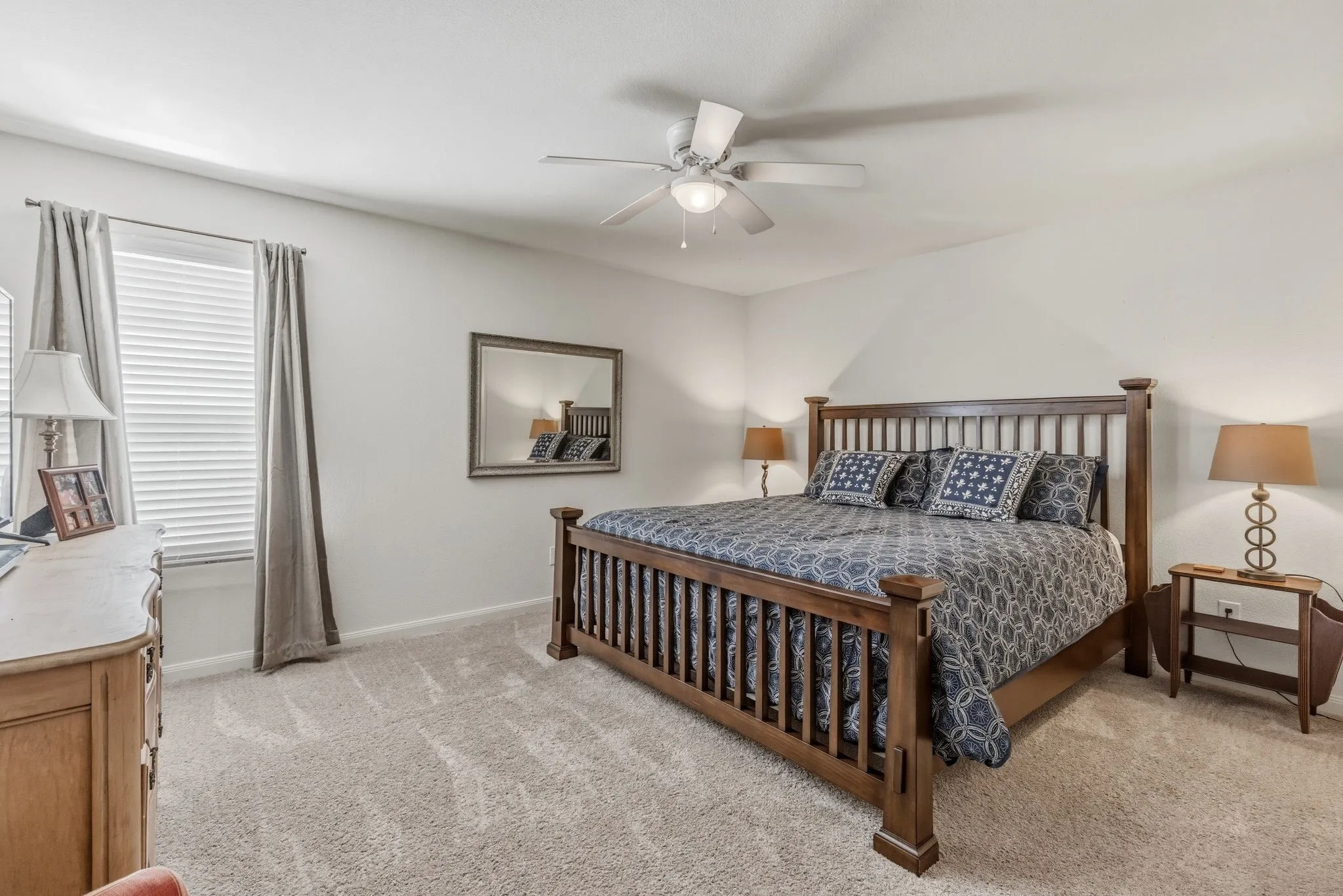 Secondary bedroom is large and easily accommodates this king size bed.