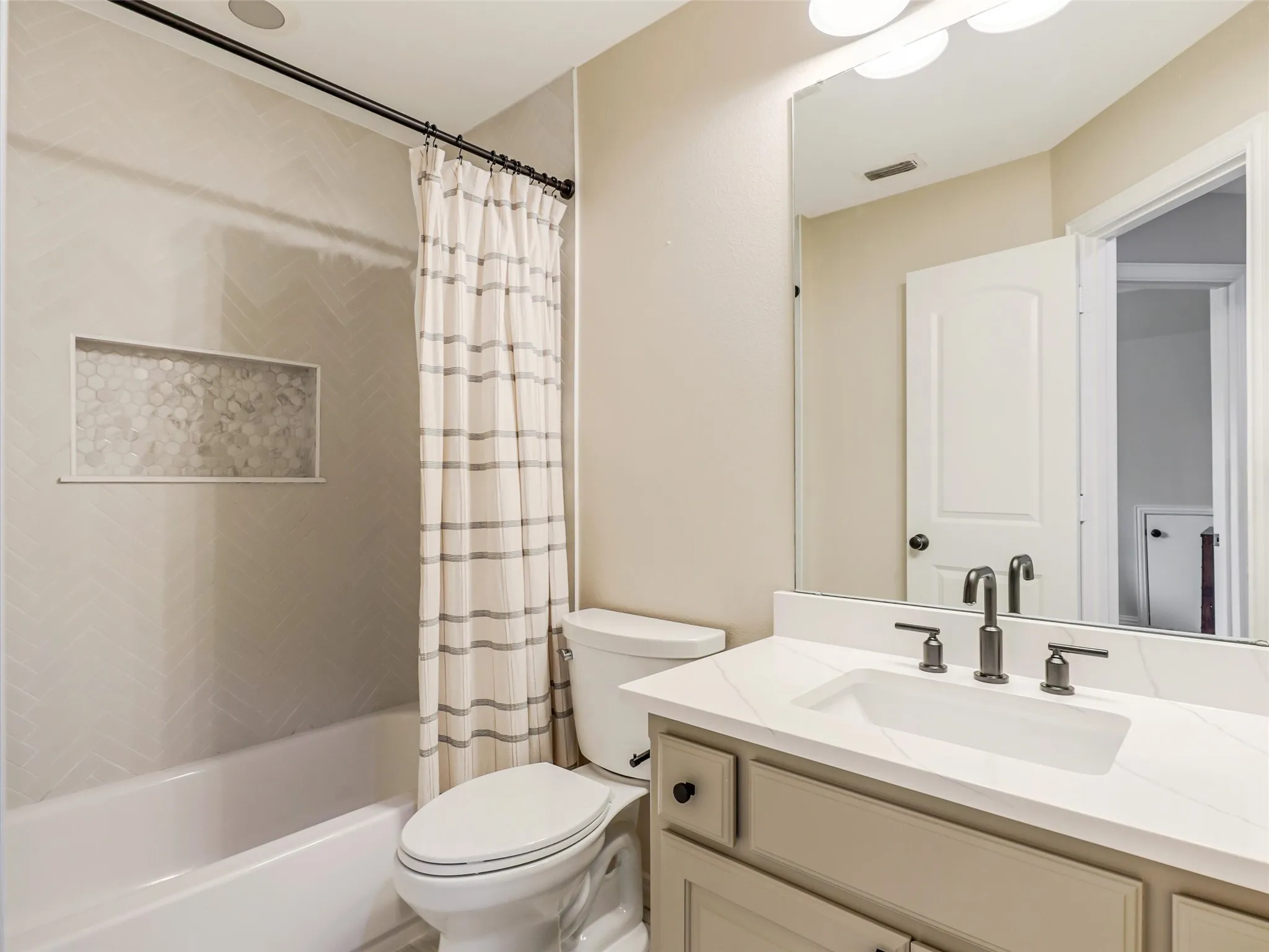 Full bath adjacent to Bedroom 5