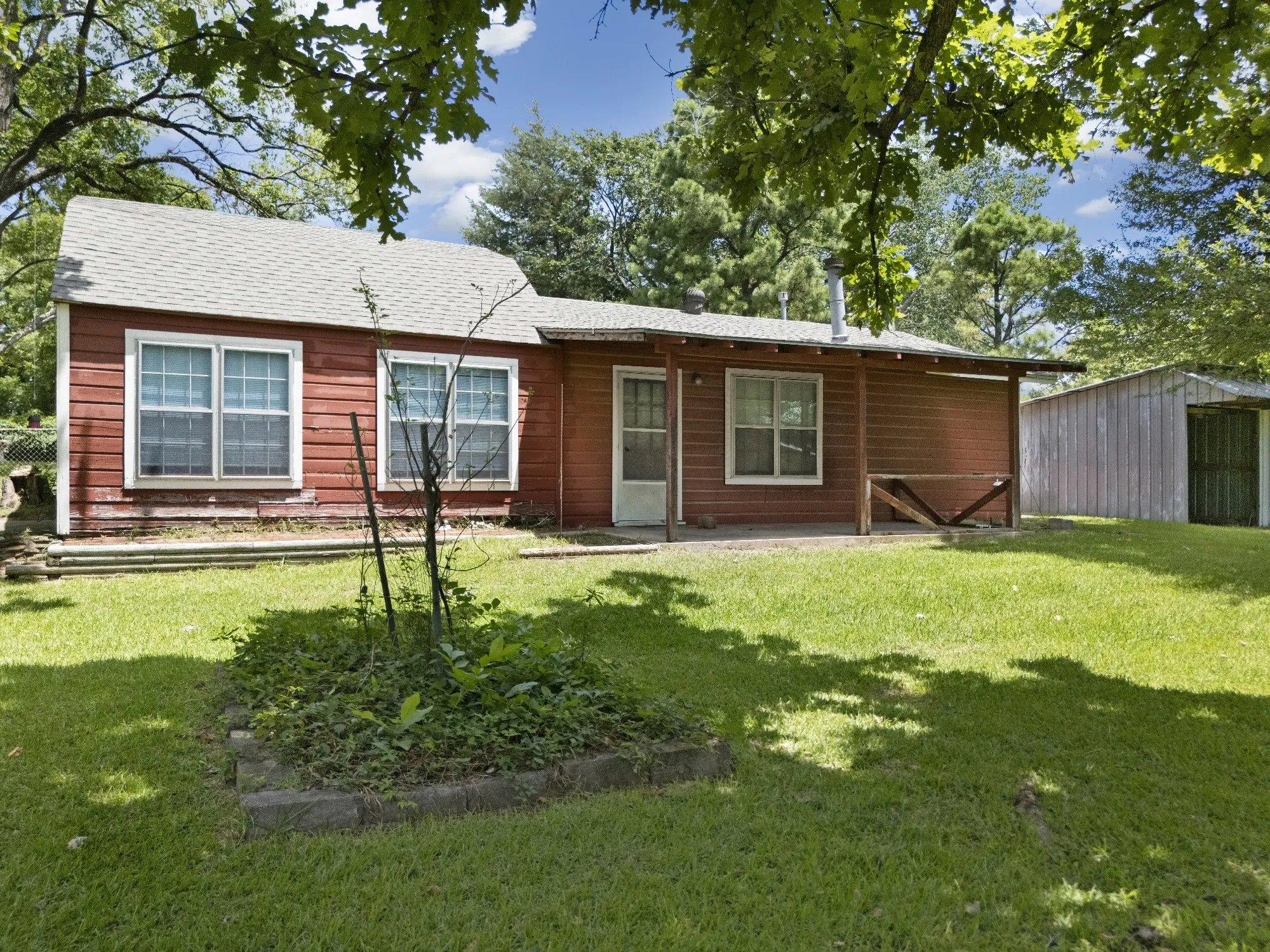Front of Additional Dwelling Unit with concrete porch and awning