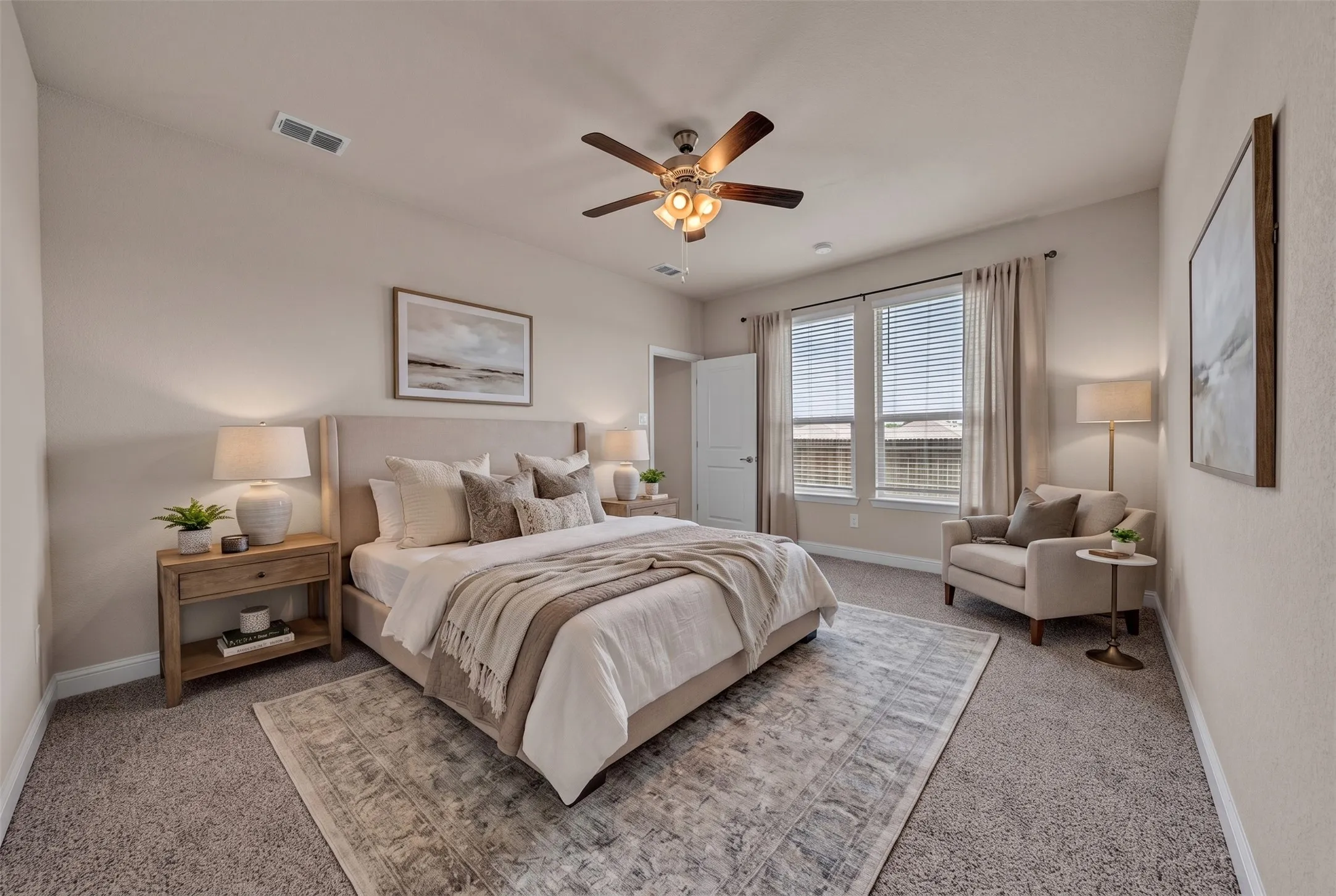 Carpeted bedroom featuring multiple windows with blinds and drapes