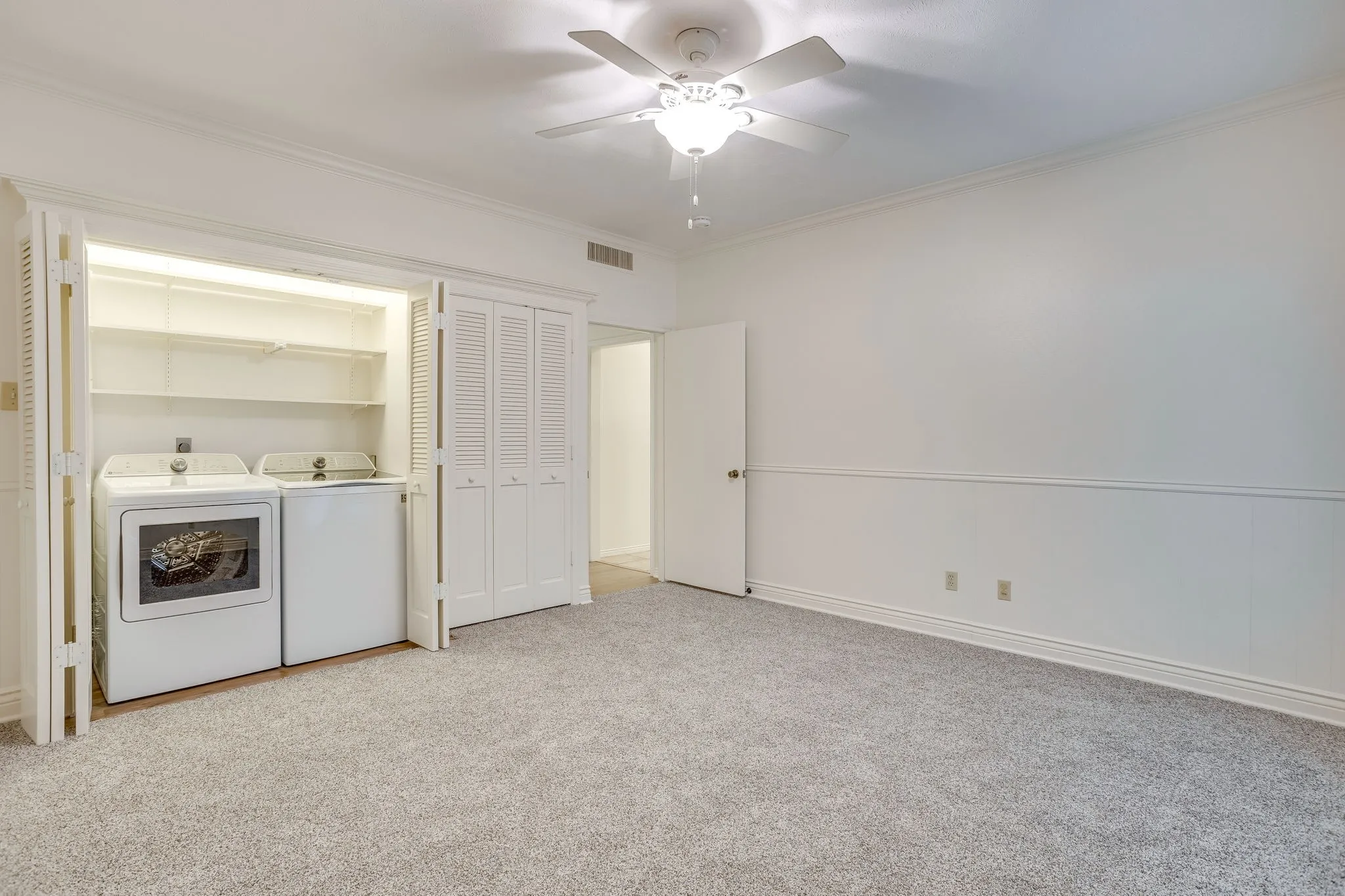 The laundry is located in the second living space.