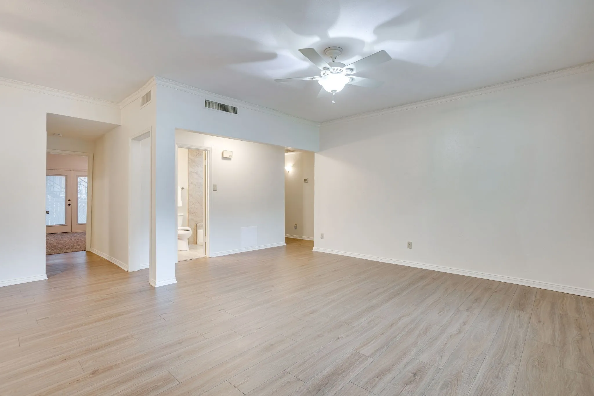 Fresh paint and floors throughout the home.