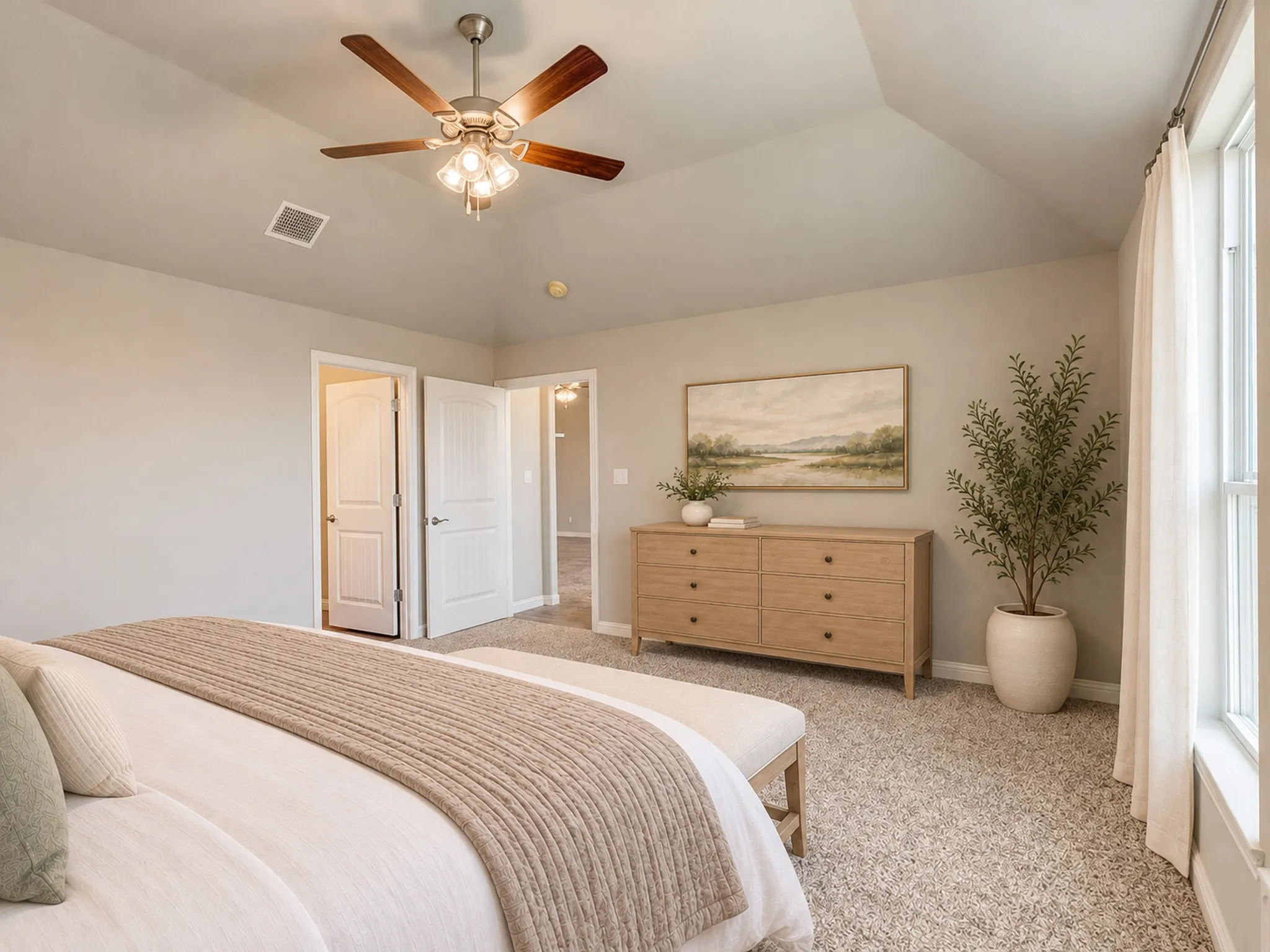 Vaulted ceiling with a ceiling fan light fixture, carpeted flooring, and a window with curtain rod