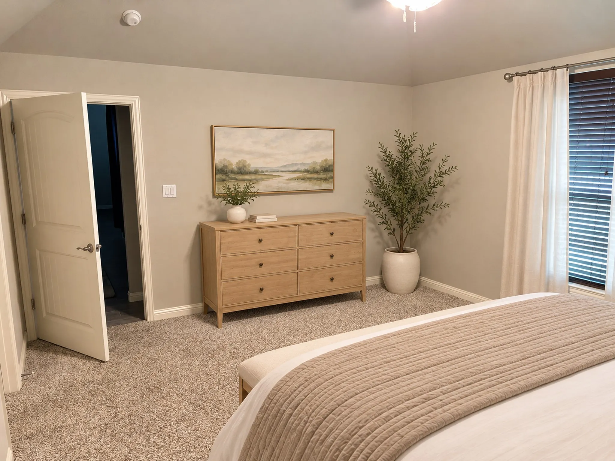 Plush carpeting, recessed window with blinds, and neutral wall tones