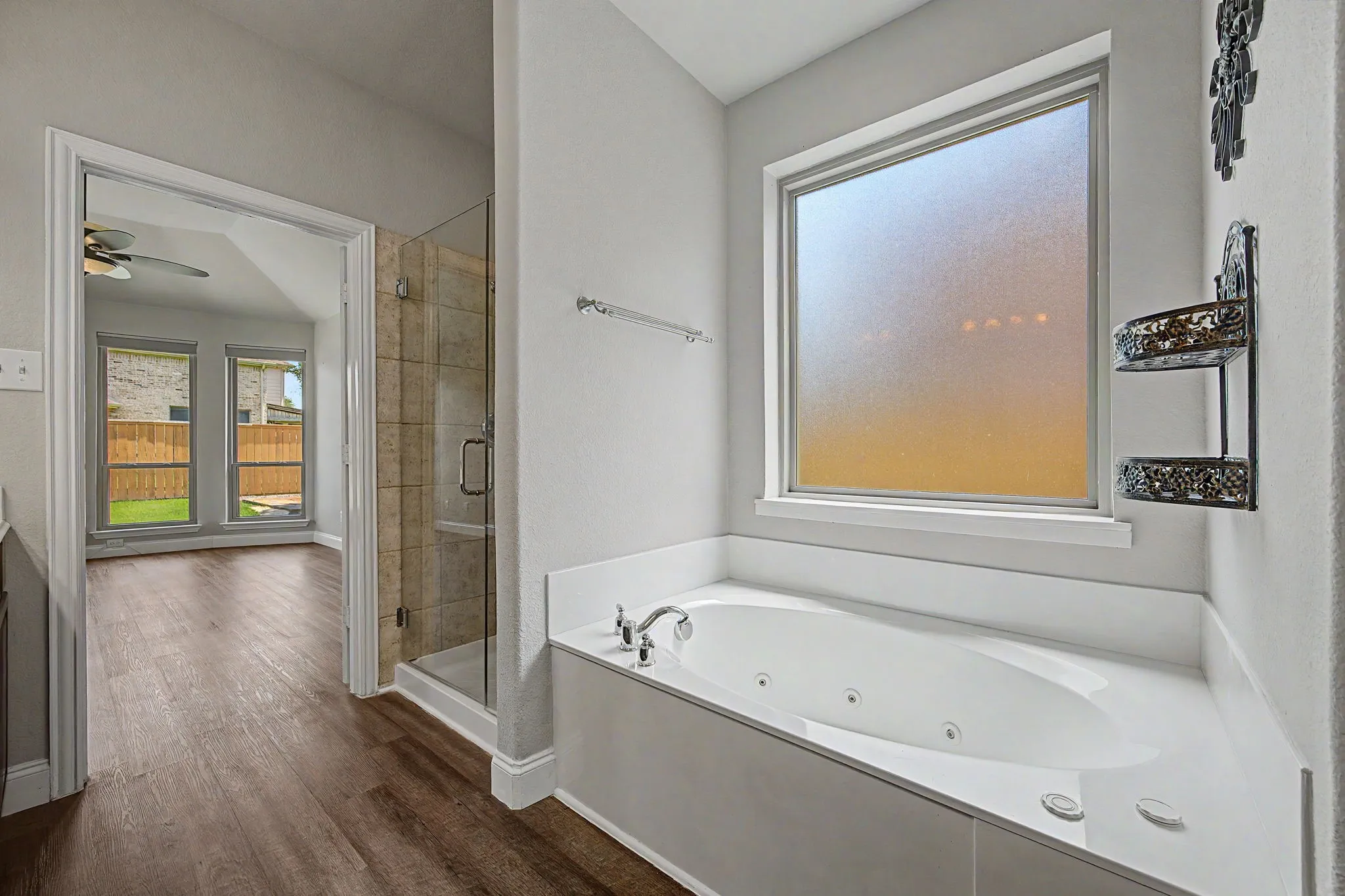 Jetted tub in pristine condition along with privacy window that allows in some light!