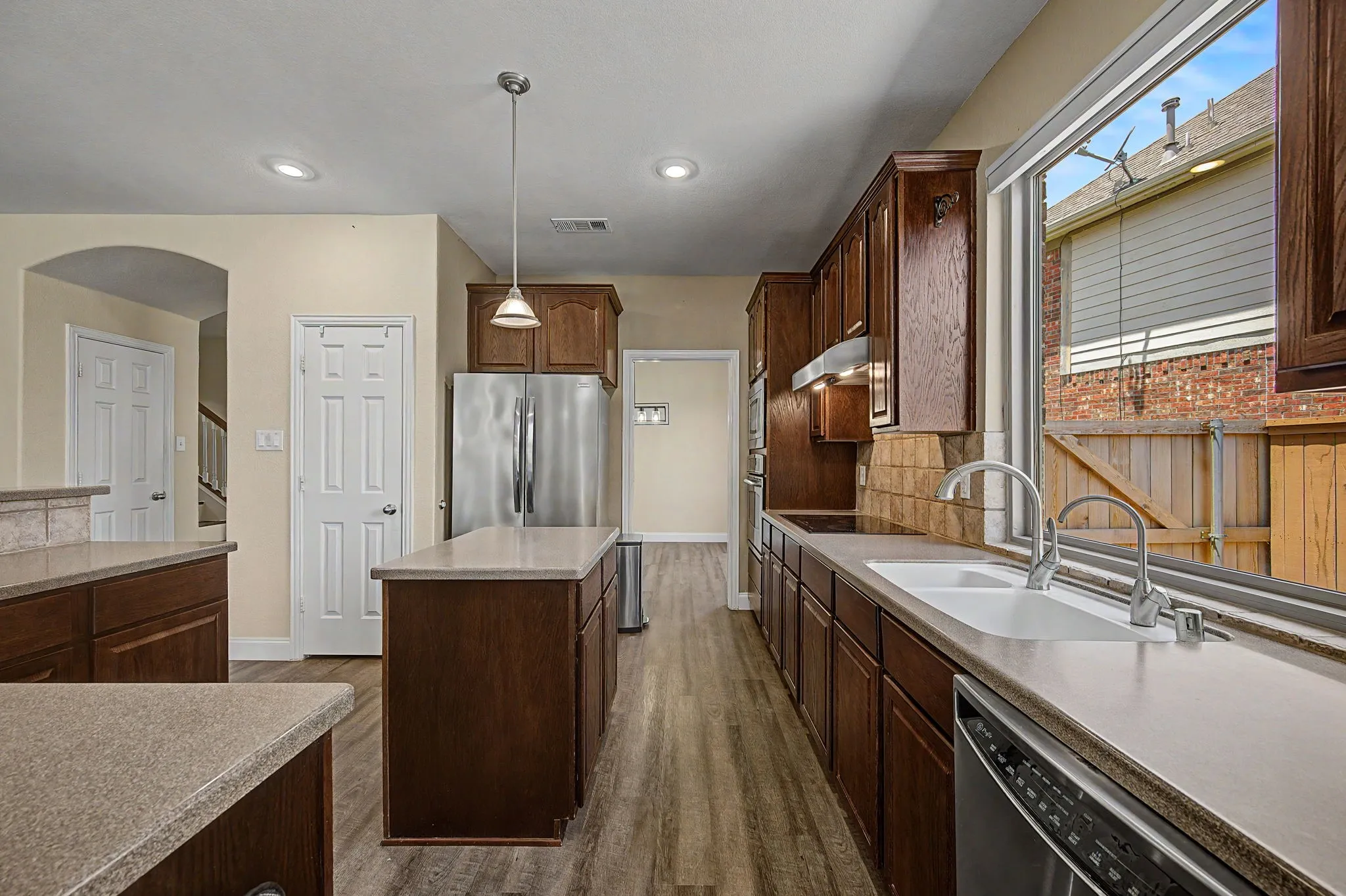 Tons of cabinet space and prep space and a walk in pantry