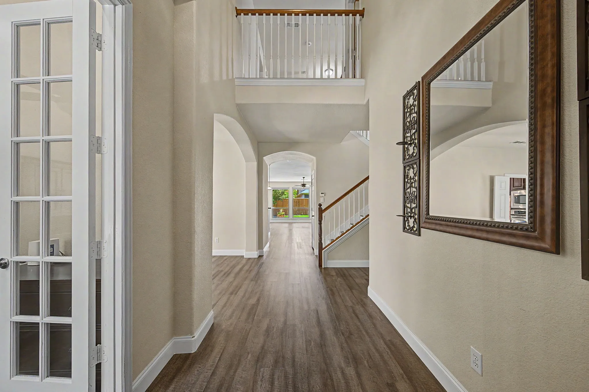 20ft ceilings at the entry  with LVP throughtout first floor