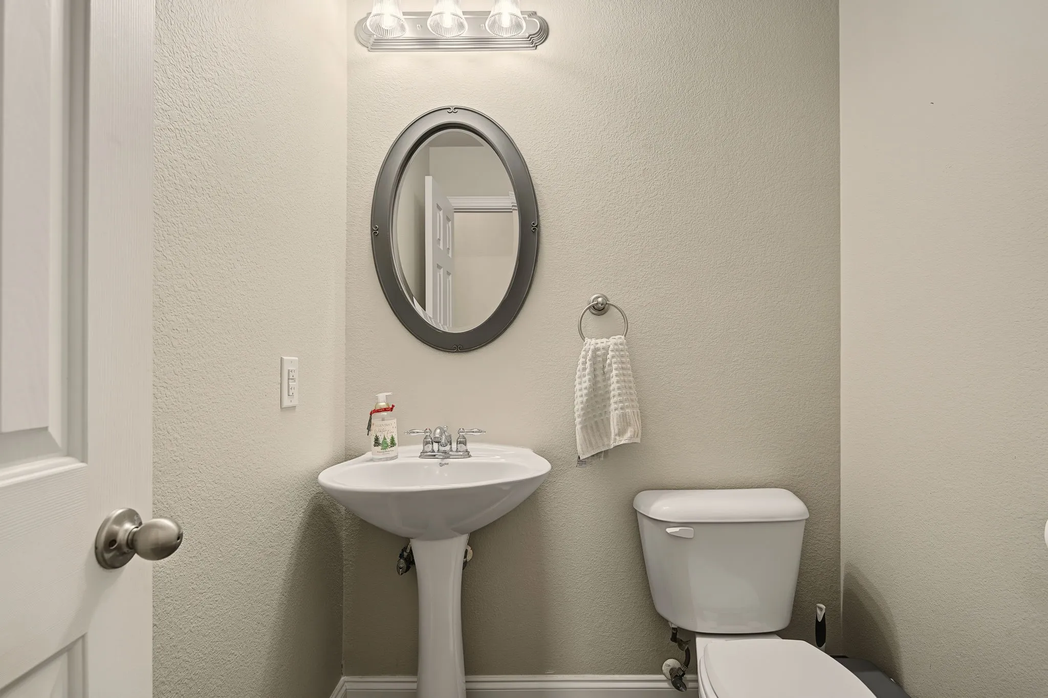 Half bath just off the family room