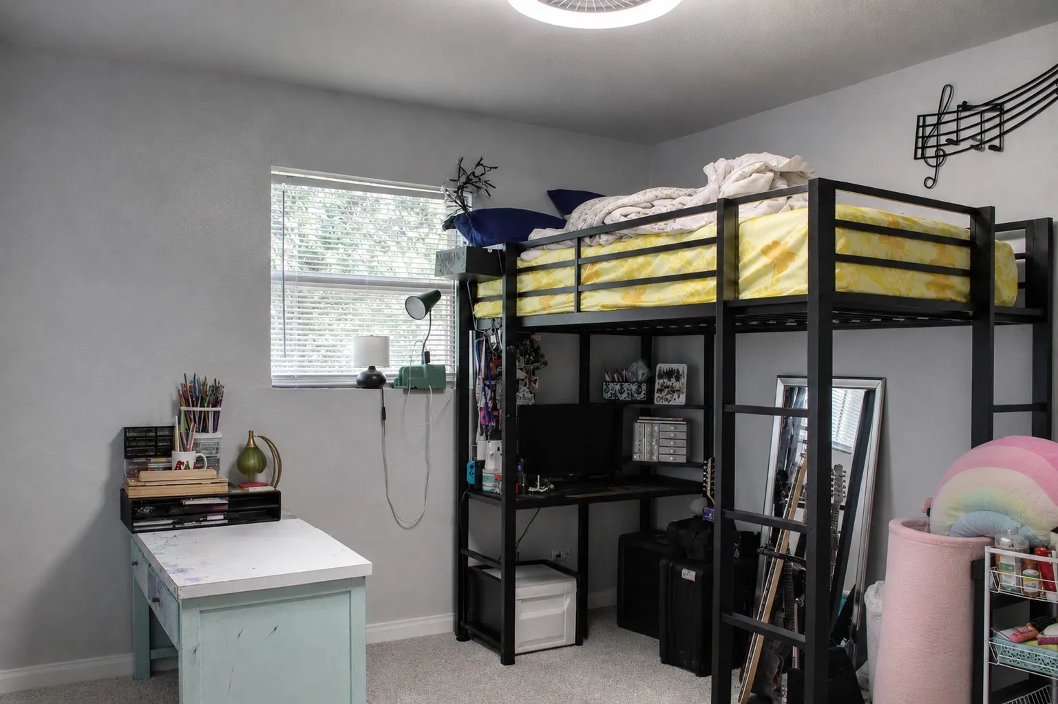Recessed window with horizontal blinds, light gray wall finish, and overhead flush-mount lighting fixture