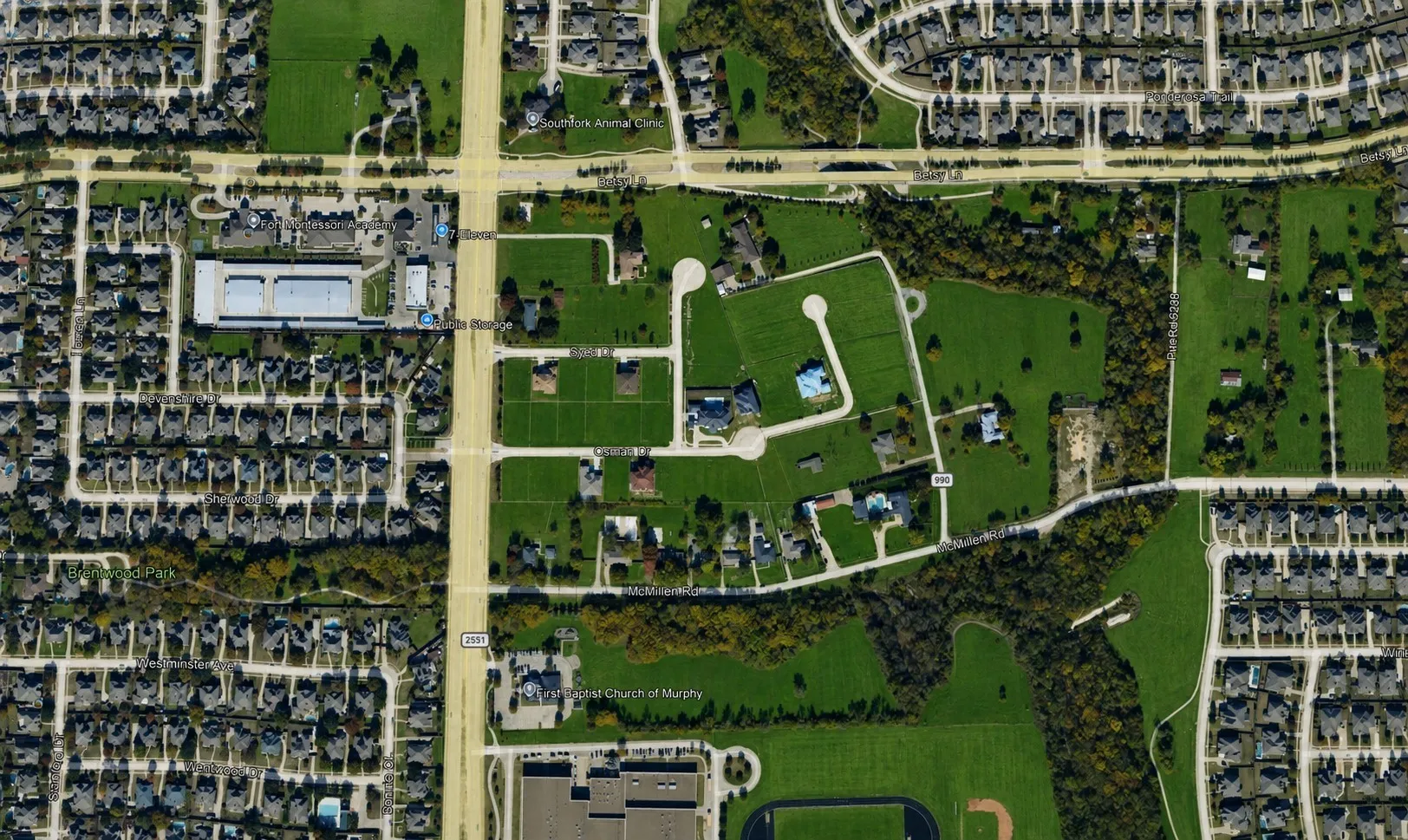 Aerial Image. Presenting an overhead perspective of the property and its surrounding area