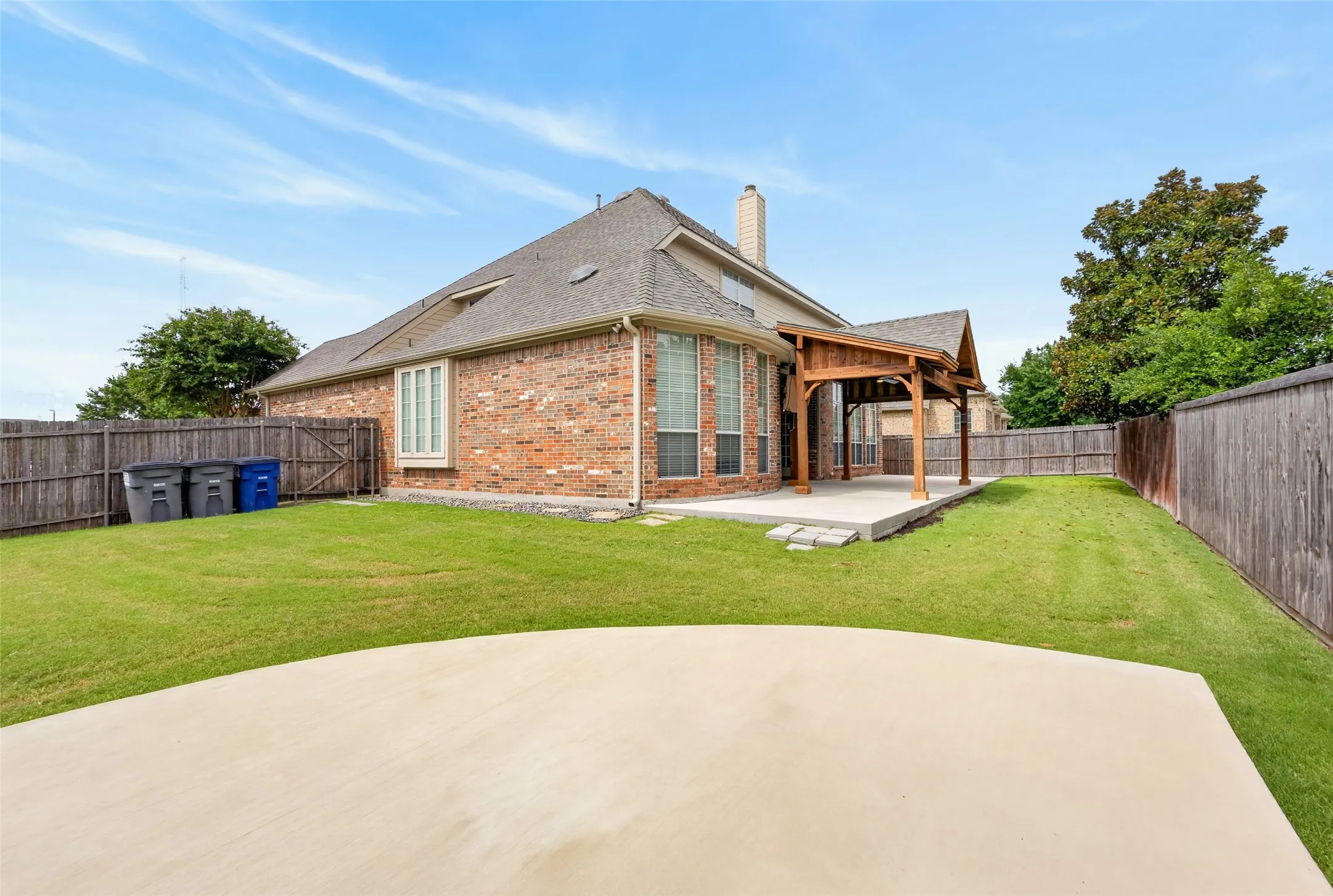 Extraordinary private fully manicured backyard perfect for family and friends!
