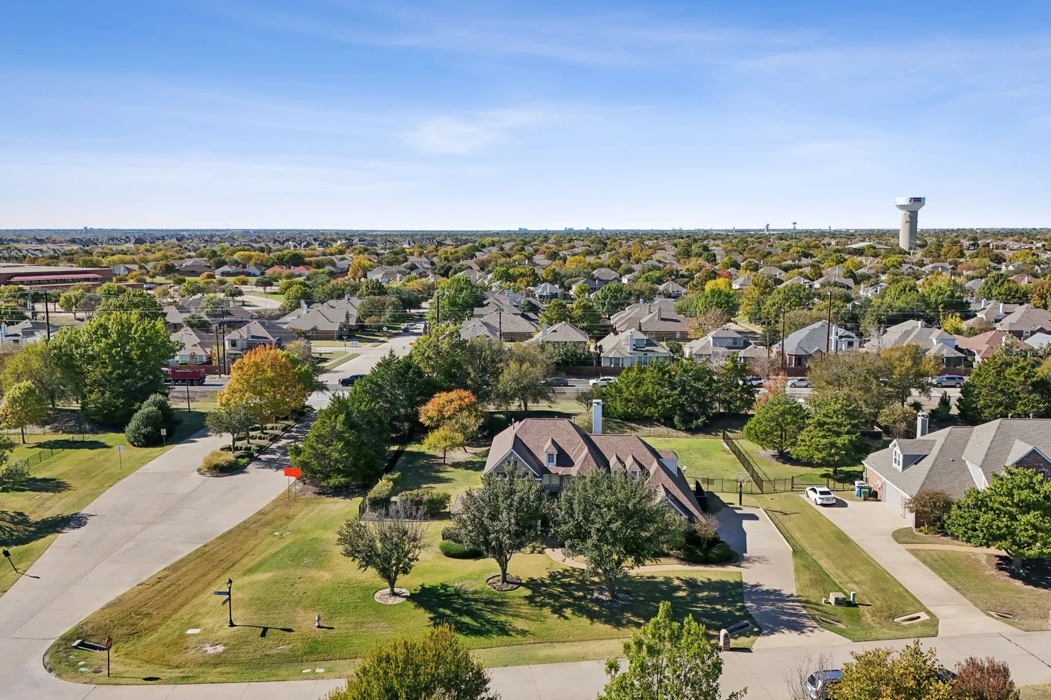 Aerial view of the home shows the lush foliage the home enjoys.