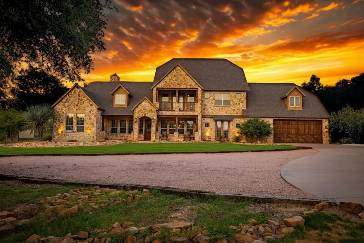 Twilight shot of this Gorgeous Rock Ranch House