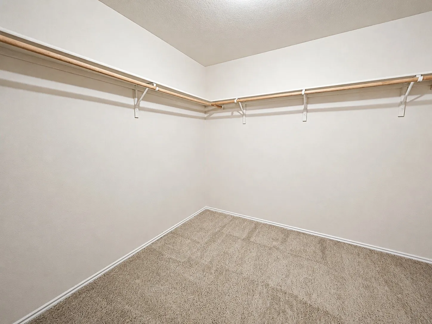 Upstairs primary closet with plenty of space