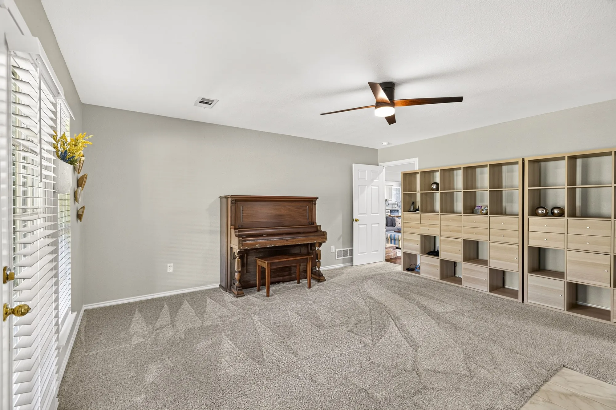Private entrance to covered porch from primary bedroom~