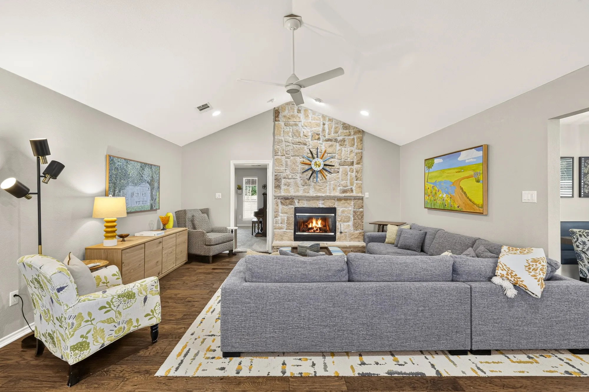 Stately stone fireplace with raised hearth~