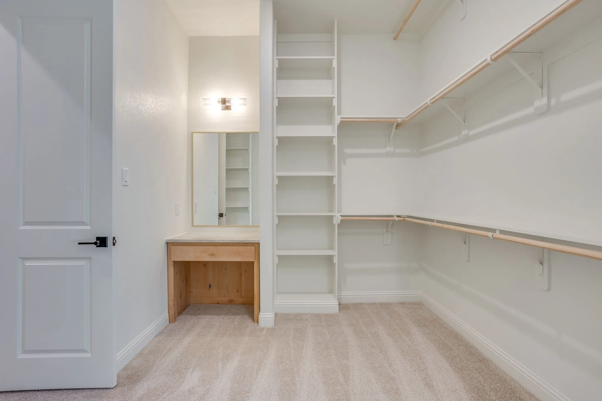 Primary Closet with vanity station