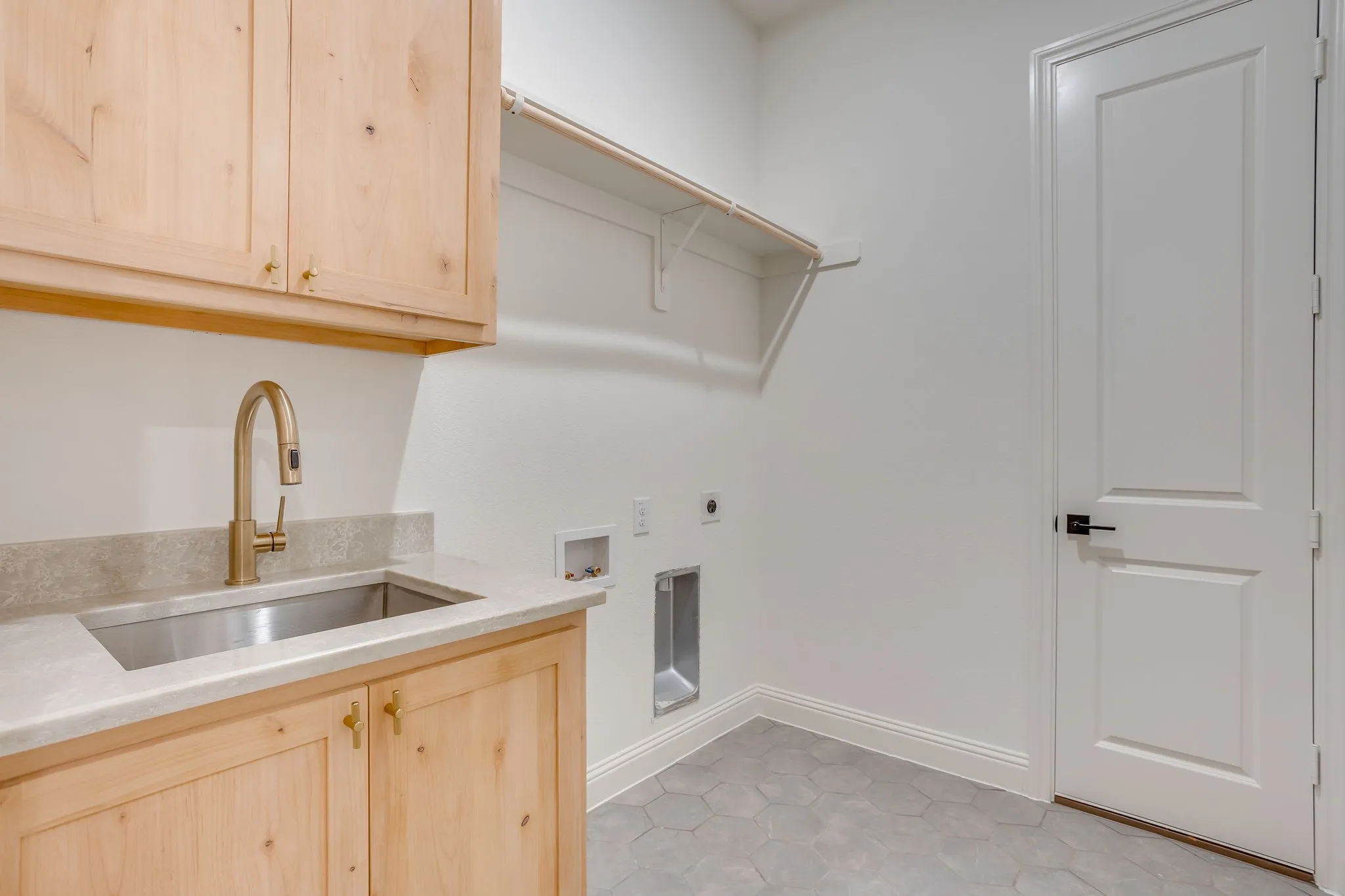 Large Utility Room with built-ins and sink