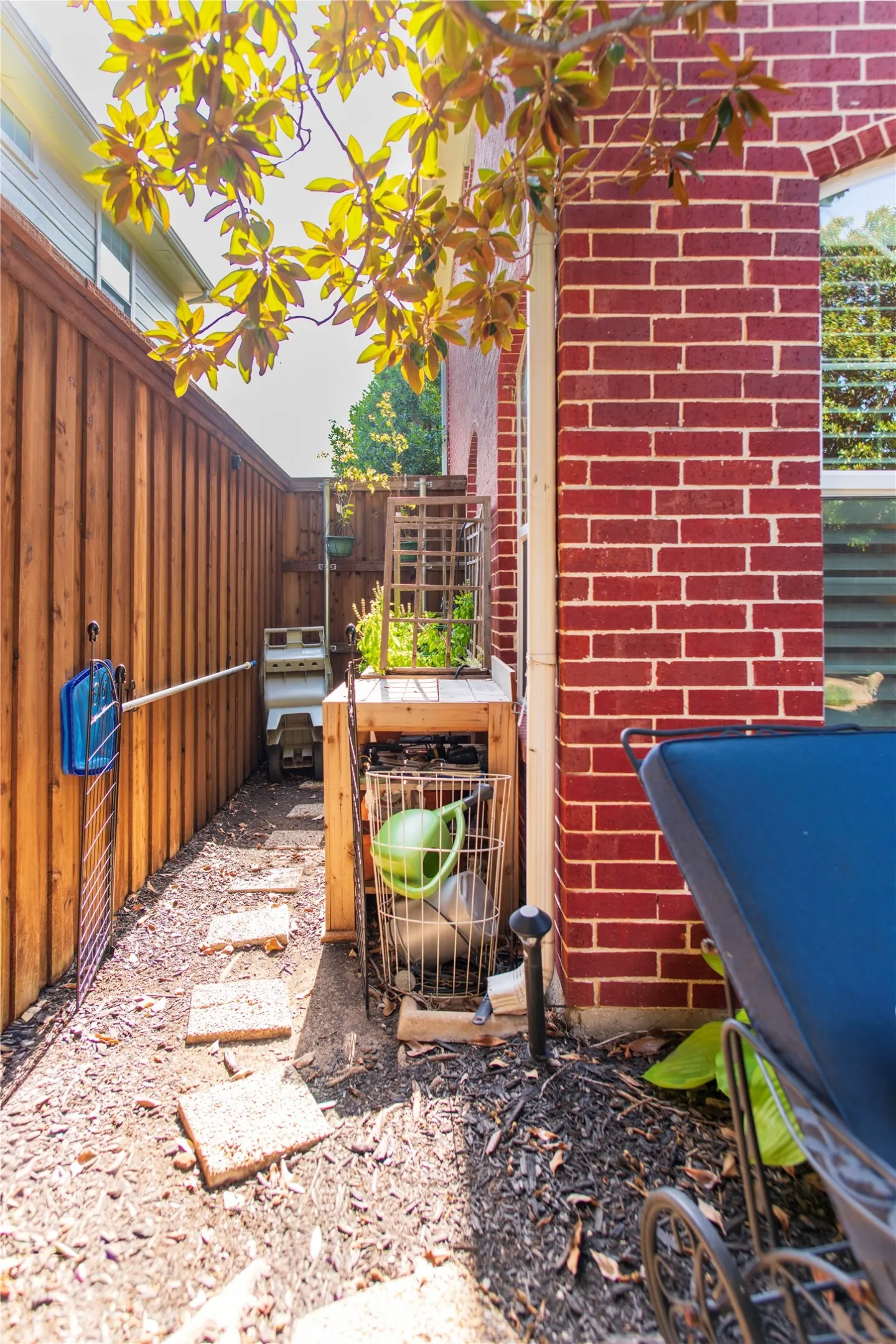 side of home with garden