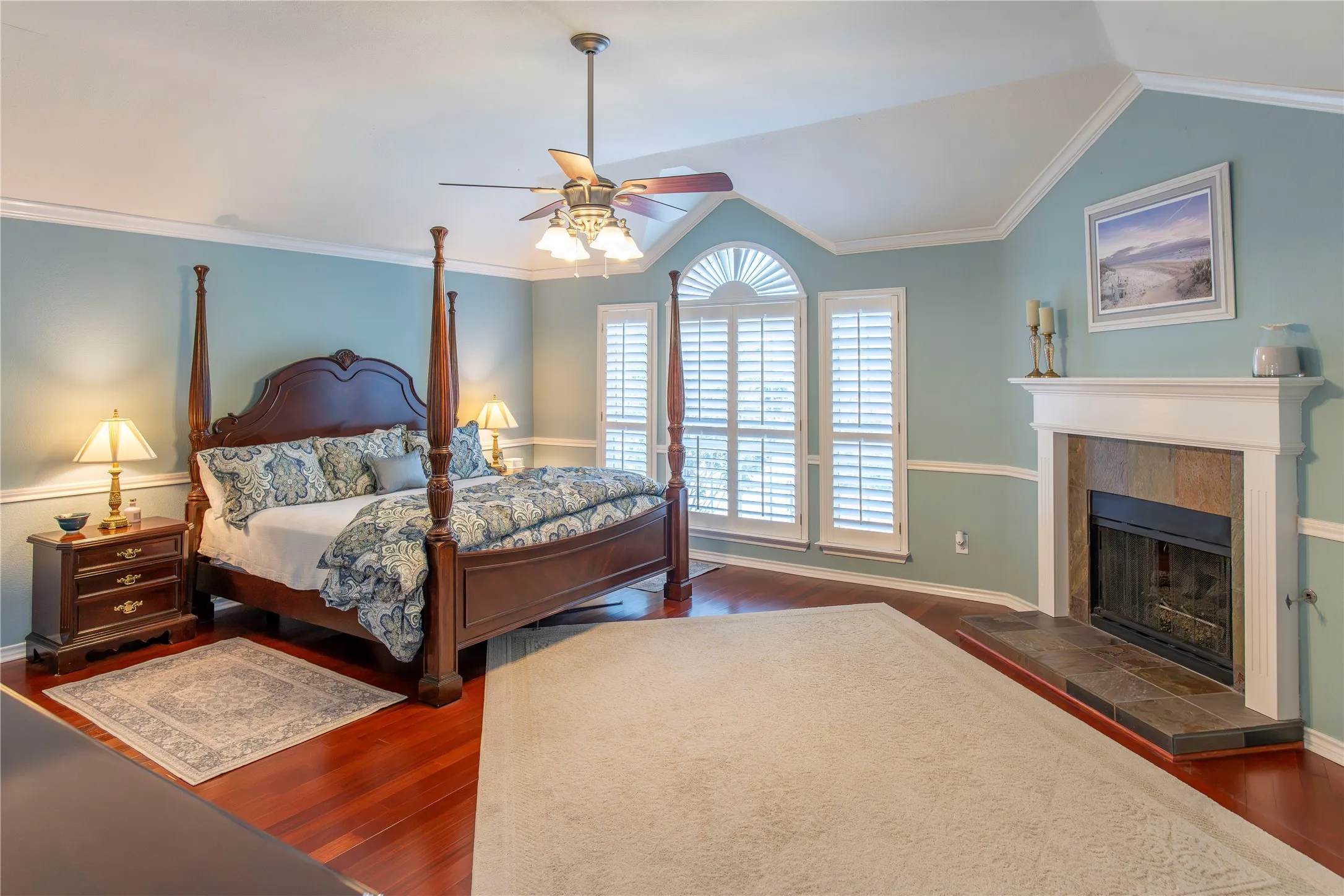 Soaring ceilings in primary with fire place