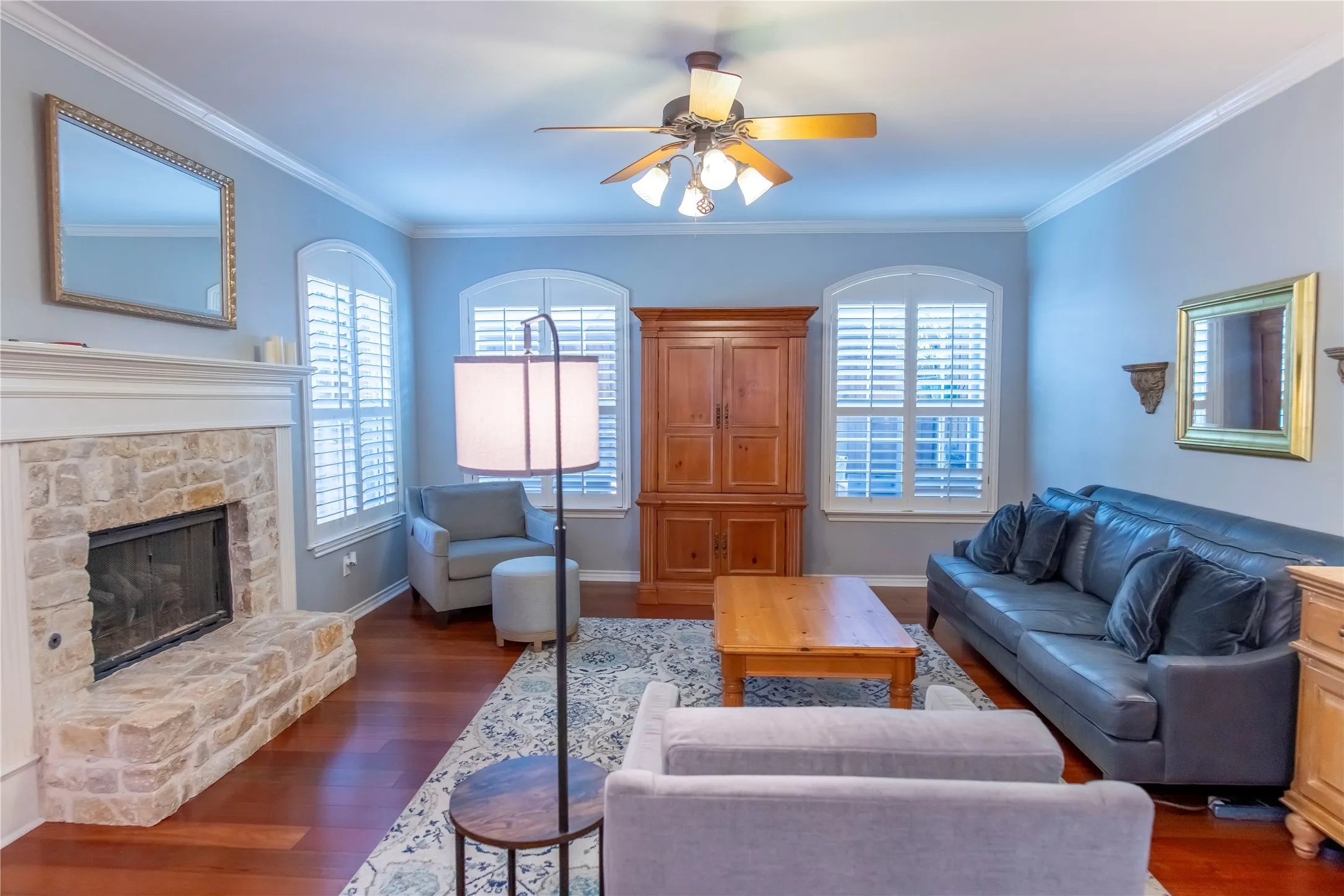 stone gas fireplace in family room