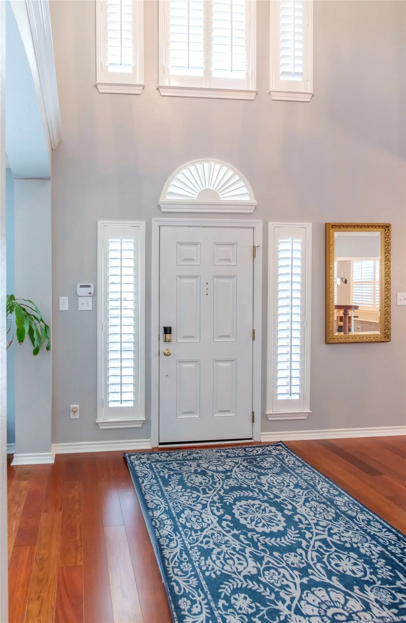 front entry with soaring ceilings