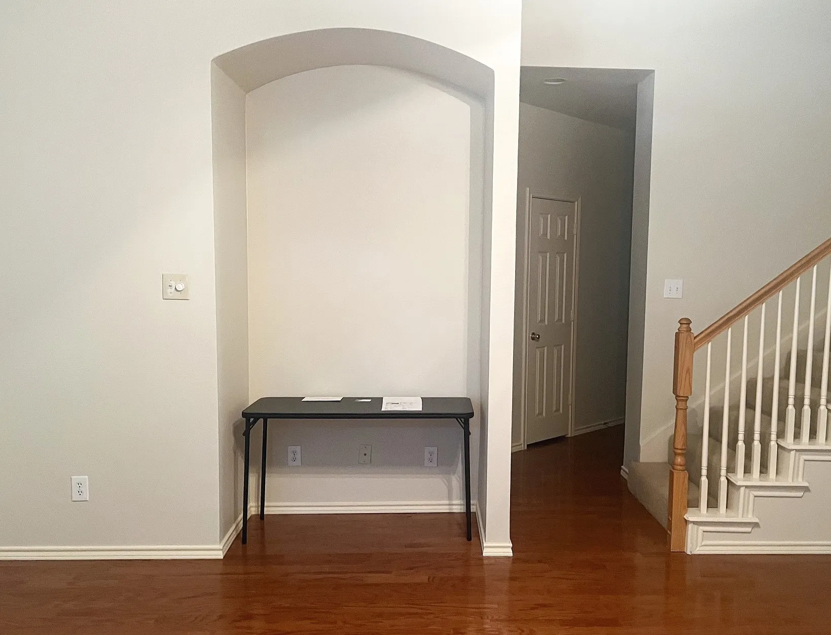 Alcove in living room is 53 inches wide and will accomodate up to a 55 inch TV.