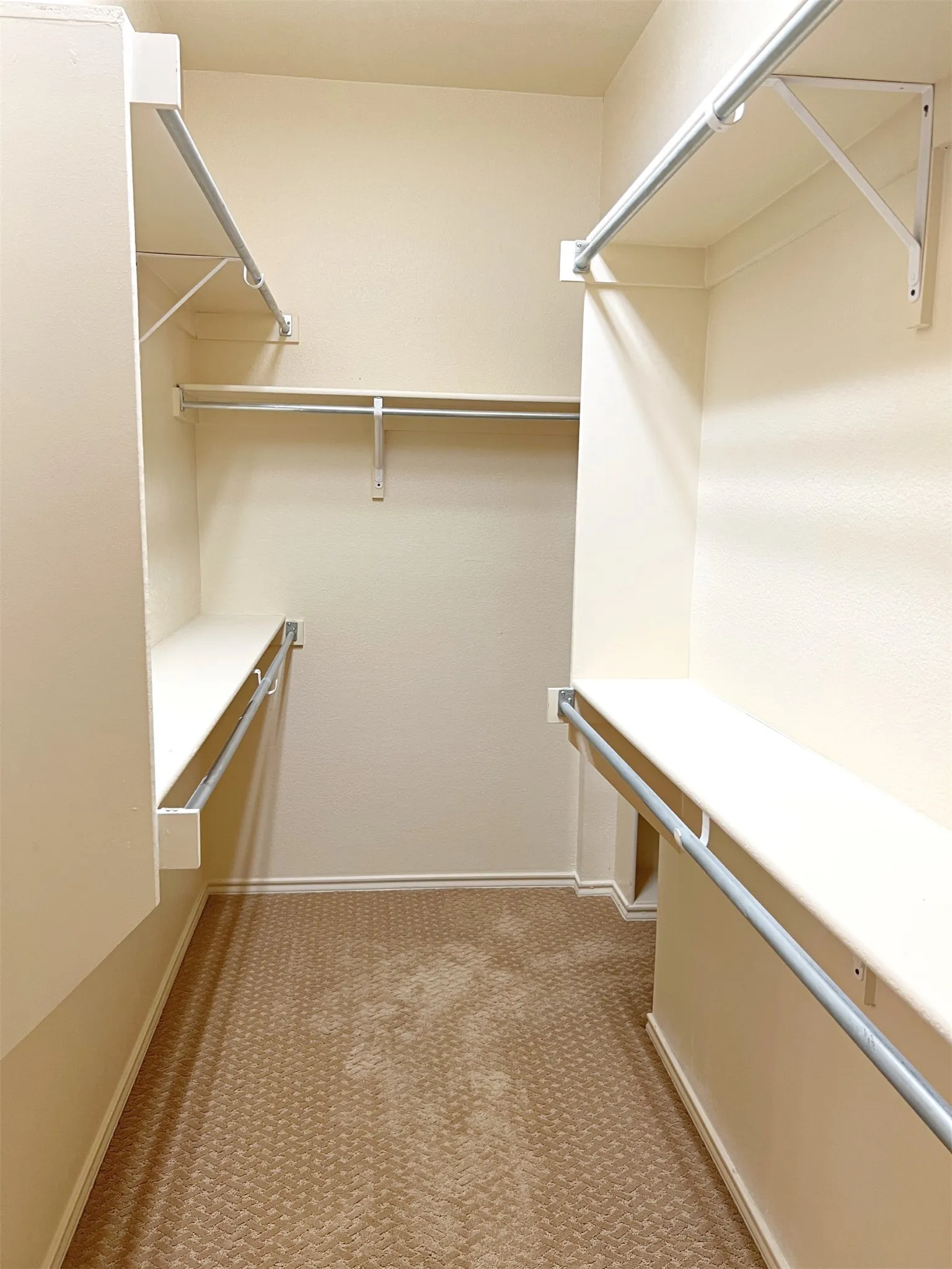 Walk-in closet in parimary bedroom
