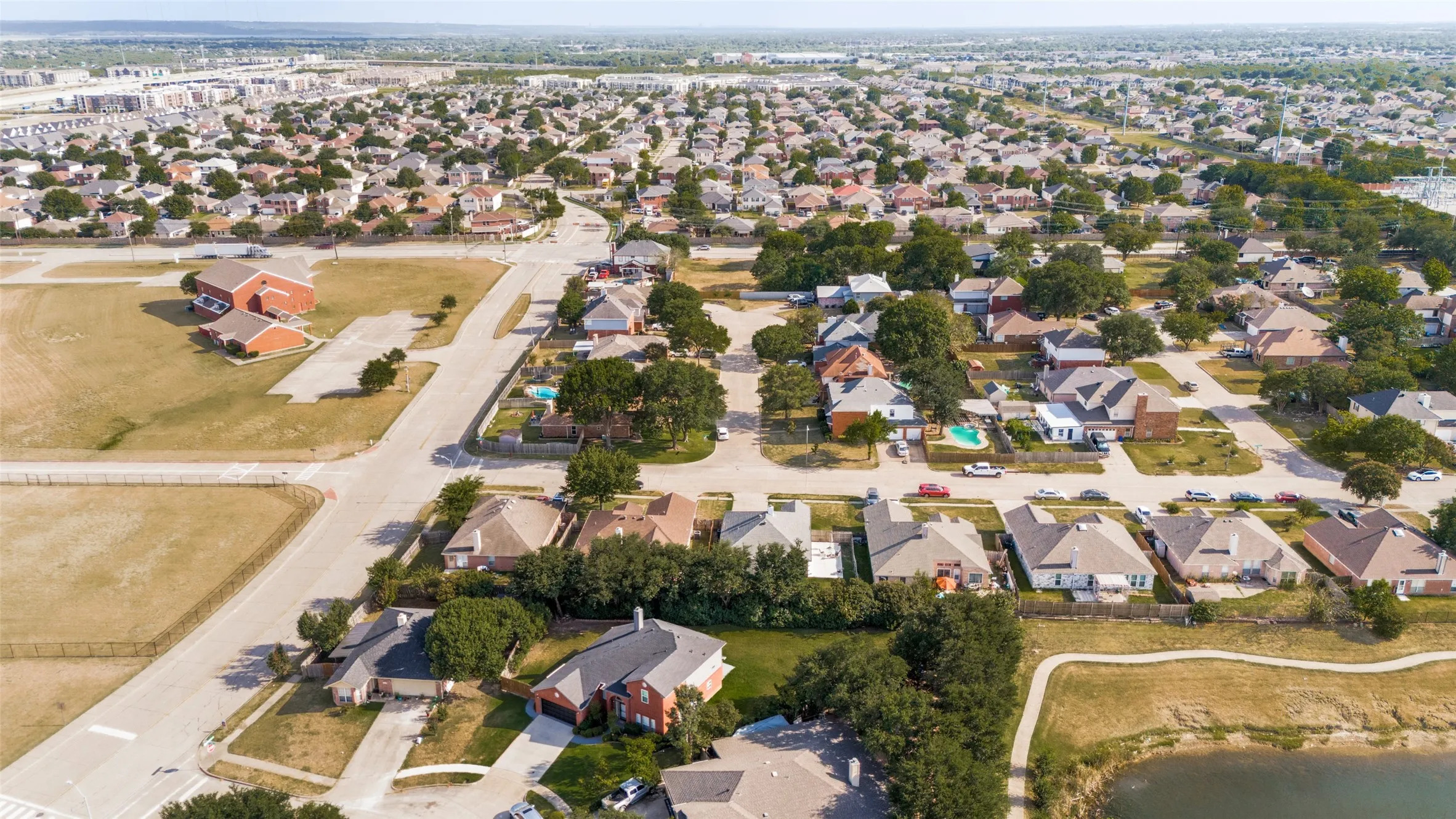 Residential community with varied architectural styles and mature landscaping