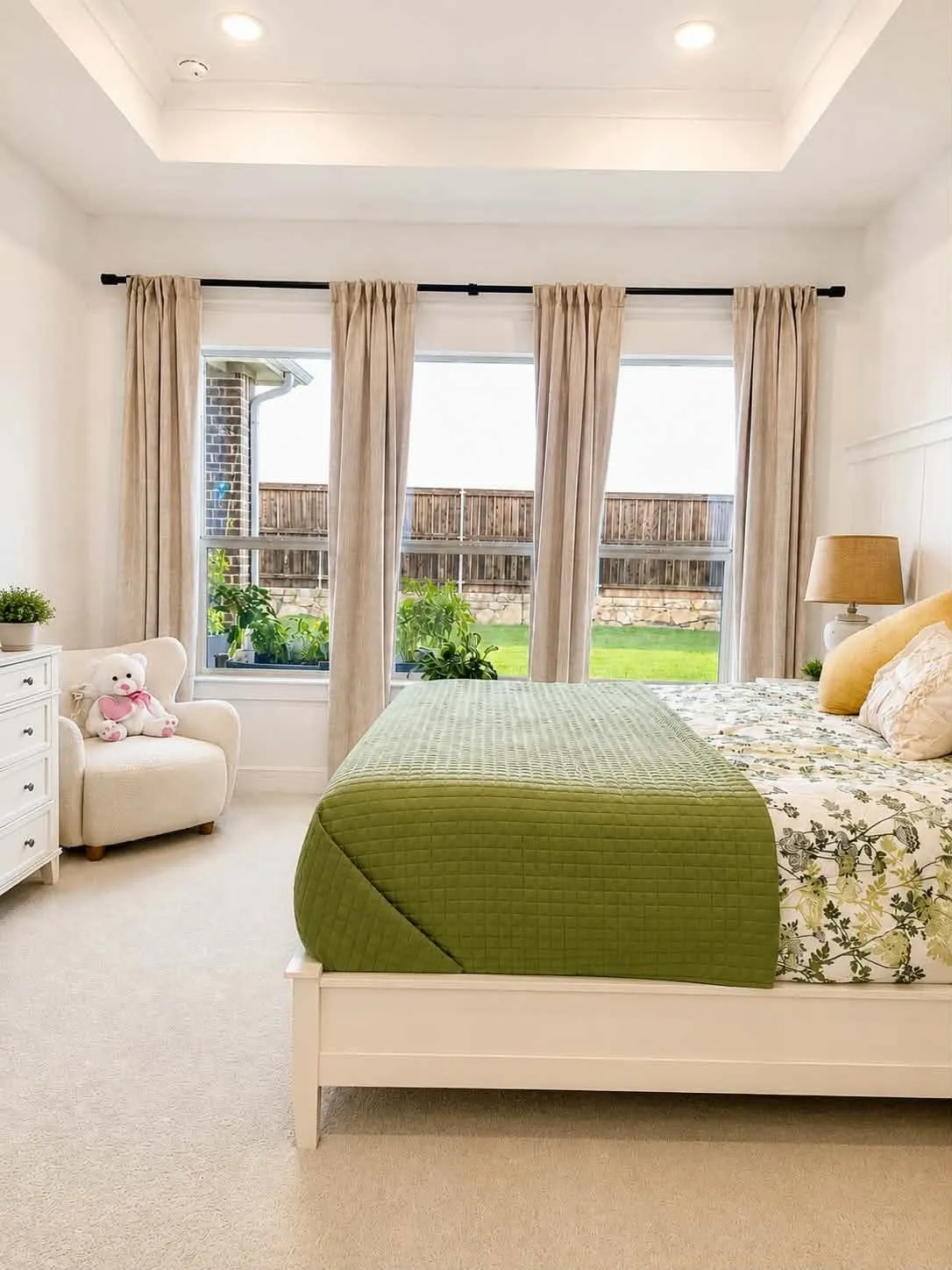 Large bedroom with spa-style bath featuring freestanding tub, oversized shower, dual vanities, barn door, walk-in closet.
