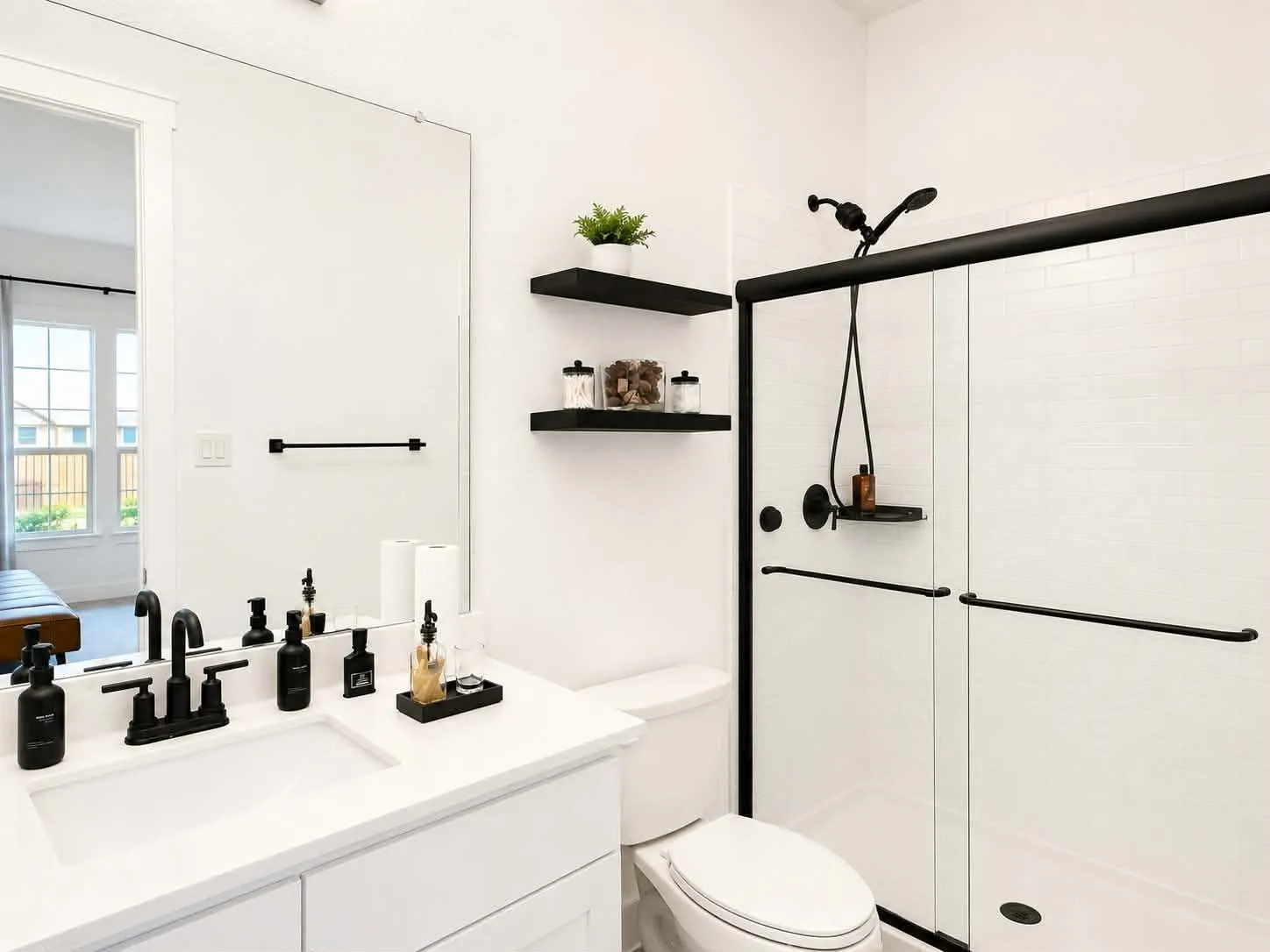 Private bedroom, full bath, and separate living room ideal for multigenerational living or guests.