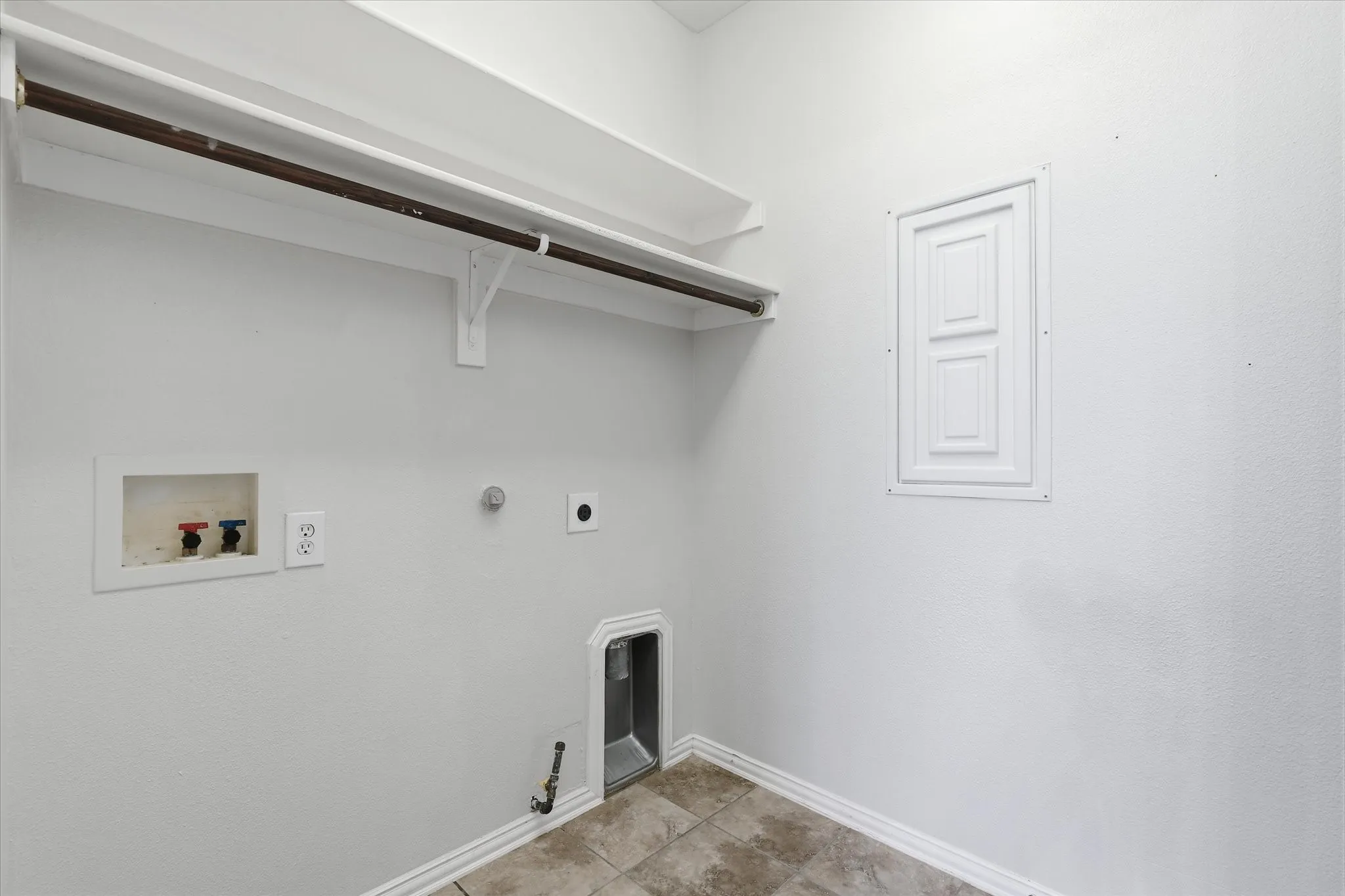 Laundry Room offers room for full size washer and dryer!