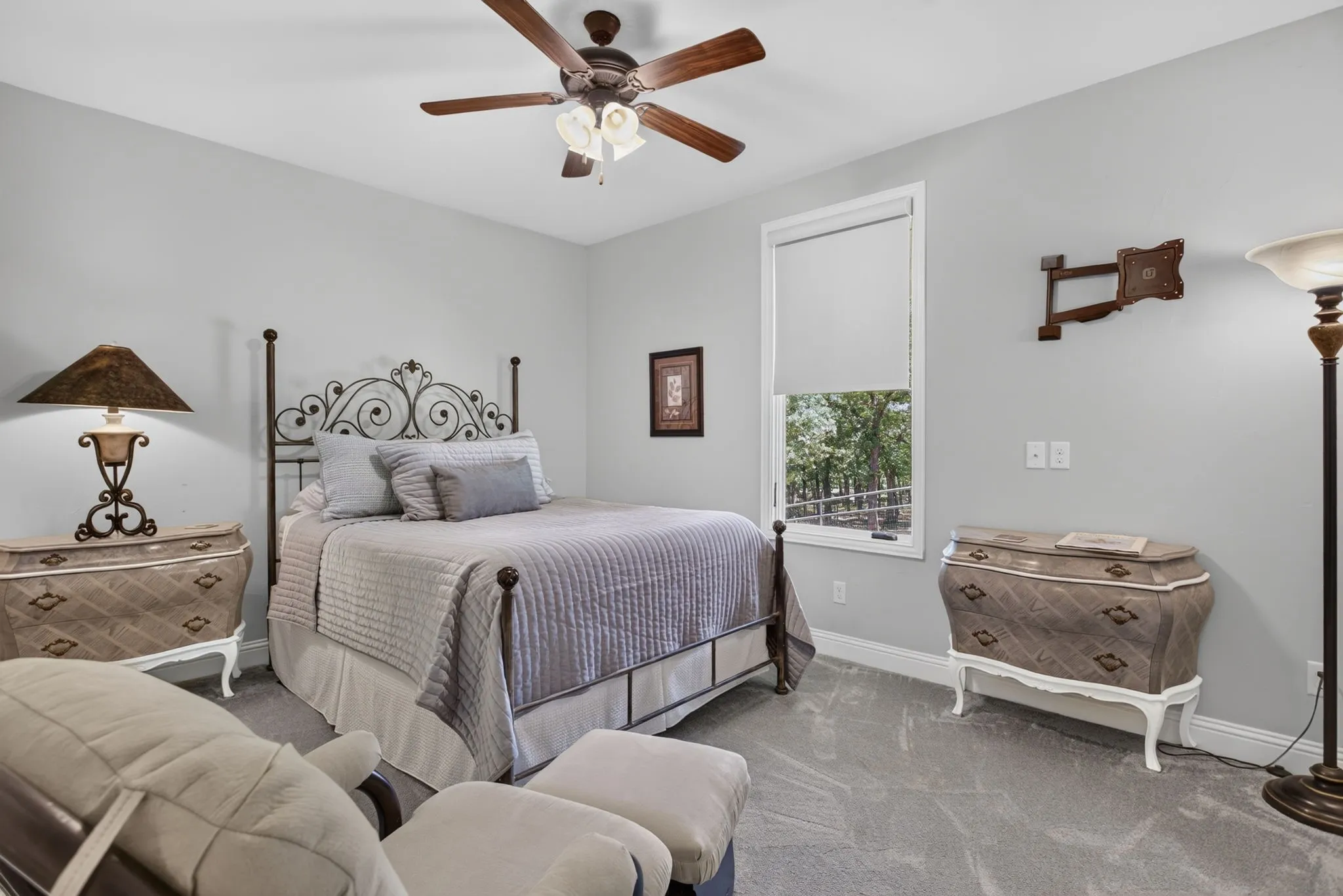 Bedroom has french doors to sunroom