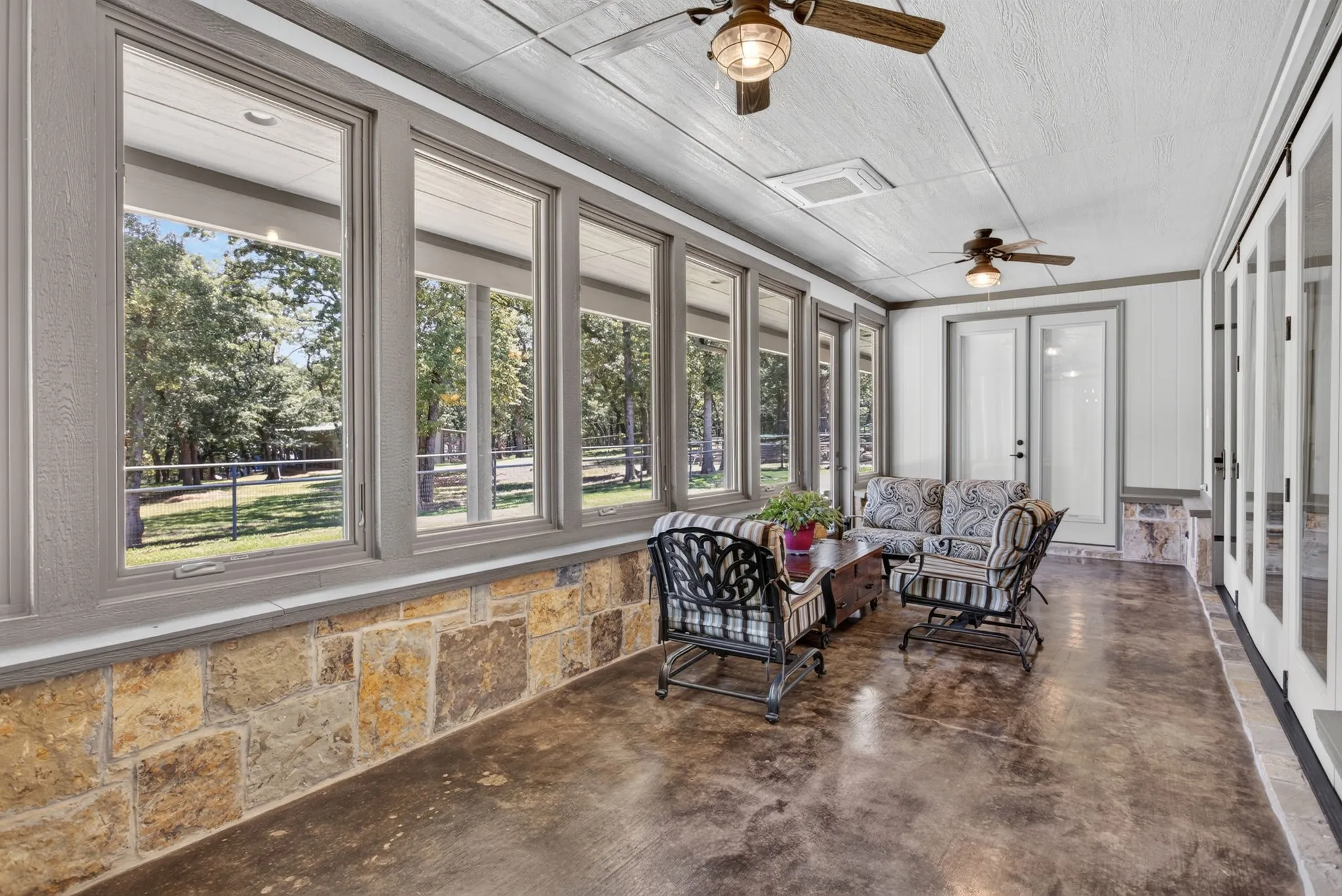 climate controlled sunroom with Jeld Wen crank windows